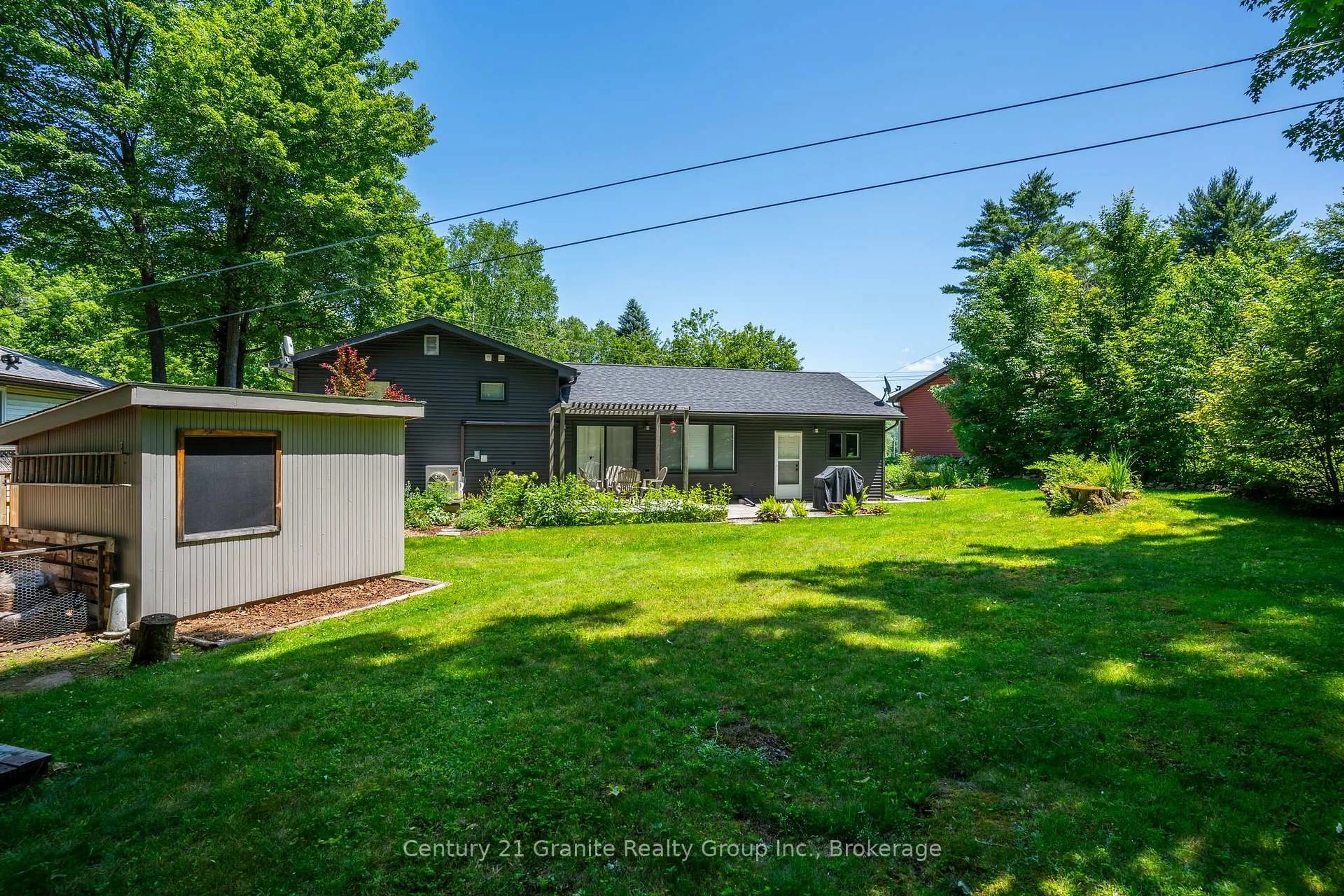 A pic from outside/outdoor area/front of a property/back of a property/a pic from drone, unknown for 22 Highland Gate Blvd, Minden Hills Ontario K0M 2K0