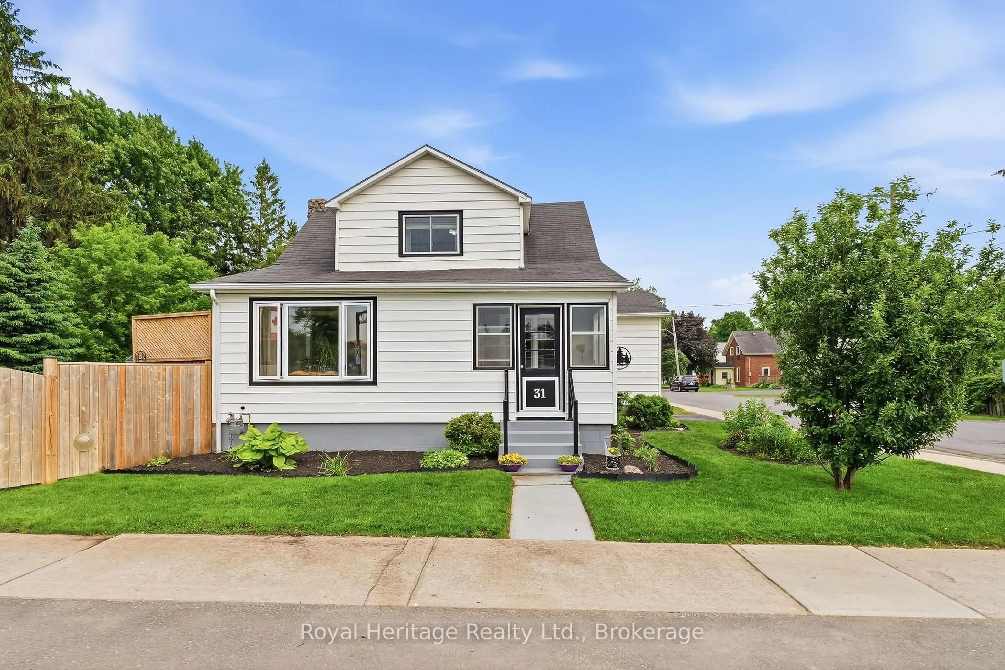 Home with vinyl exterior material, street for 31 Elizabeth St, Brighton Ontario K0K 1H0