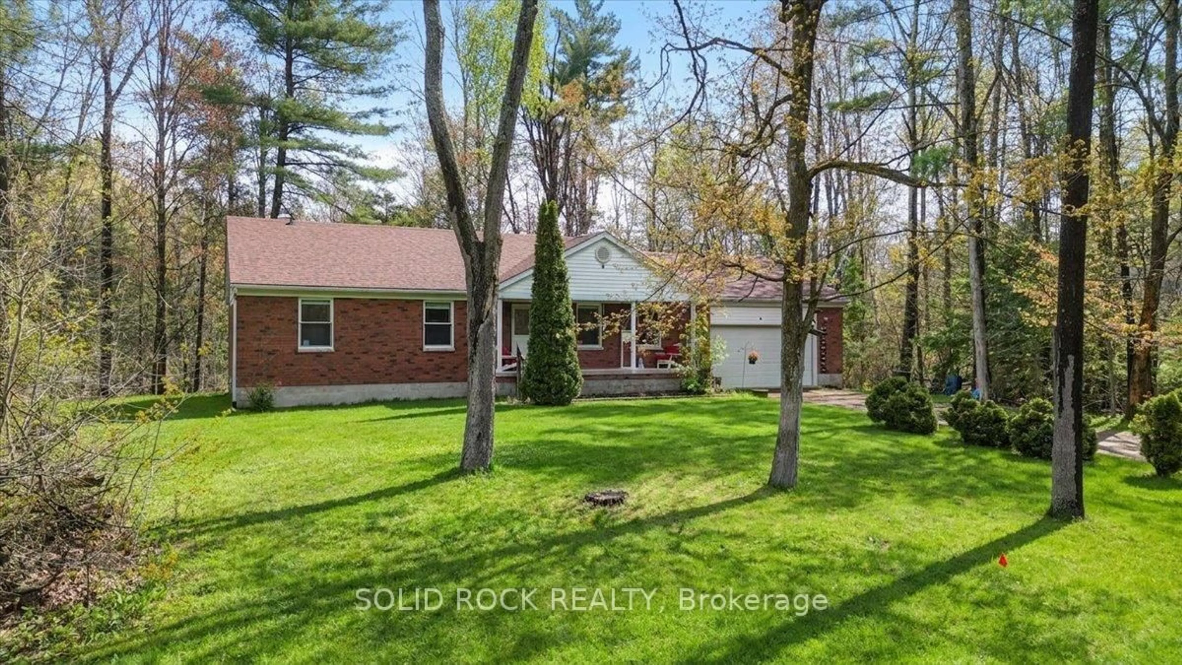 A pic from outside/outdoor area/front of a property/back of a property/a pic from drone, forest/trees view for 1326 12th Line, Trent Hills Ontario K0L 1L0