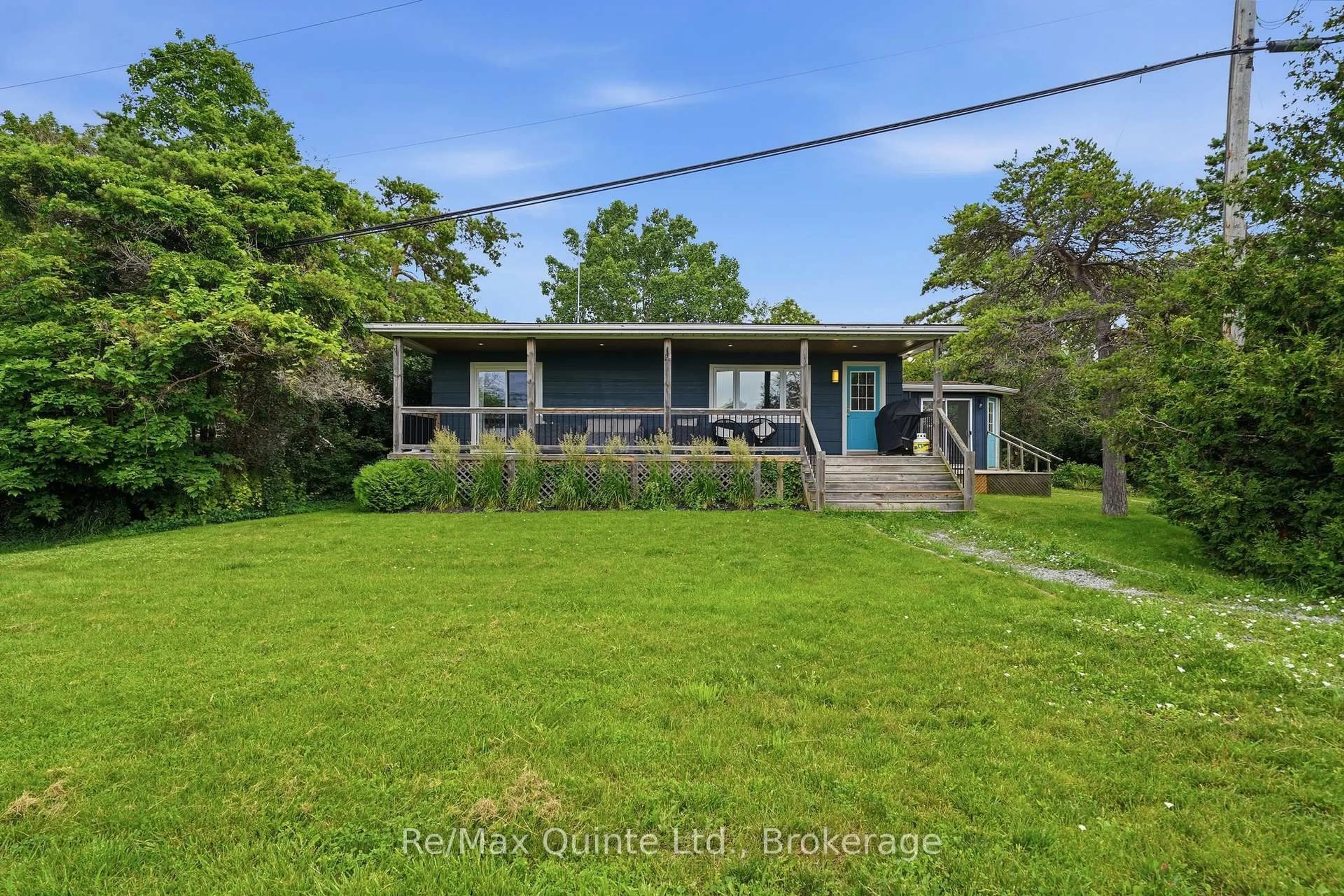 A pic from outside/outdoor area/front of a property/back of a property/a pic from drone, water/lake/river/ocean view for 6 Grays Lane, Prince Edward County Ontario K0K 1P0