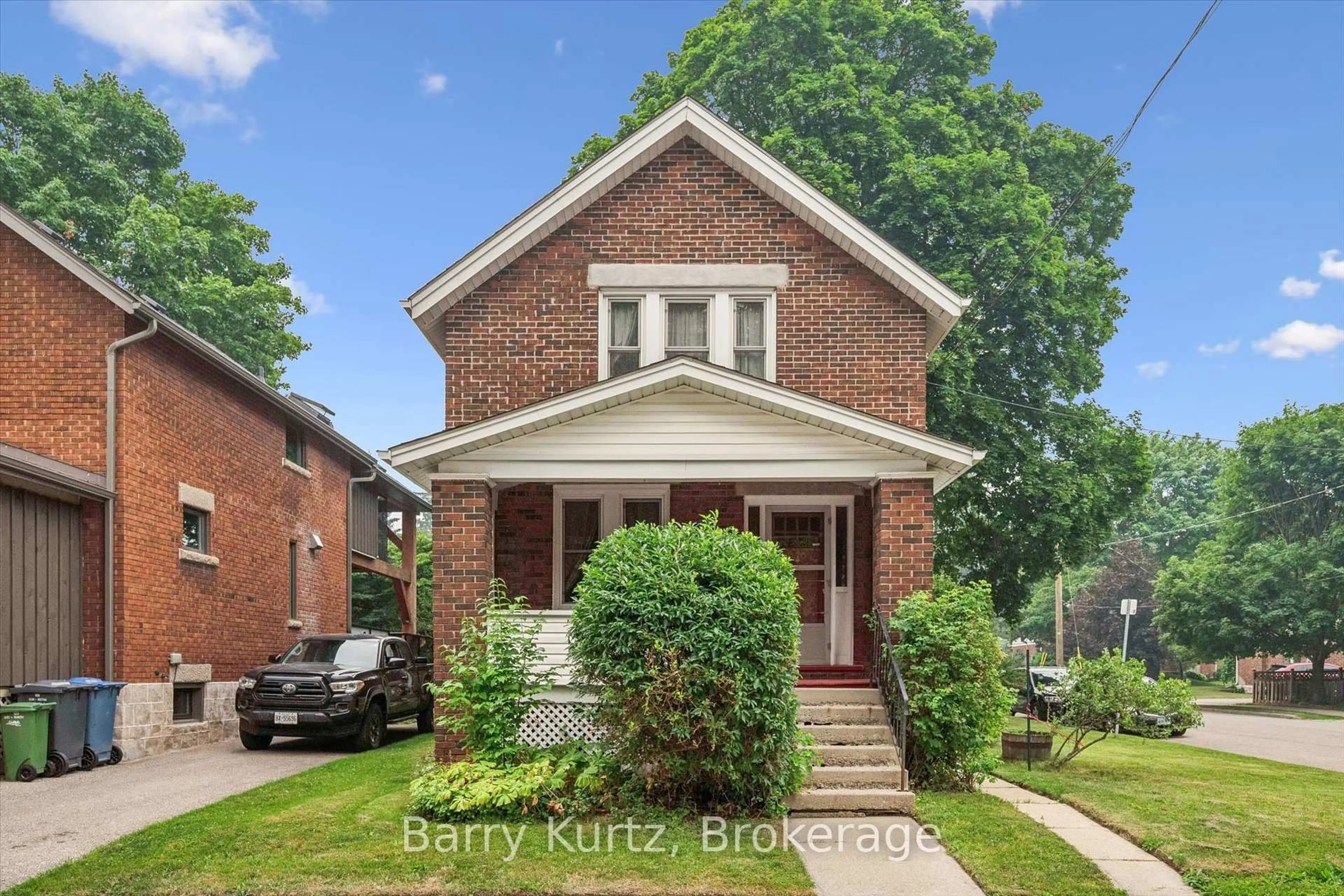 Home with brick exterior material, street for 34 Division St, Guelph Ontario N1E 1T4