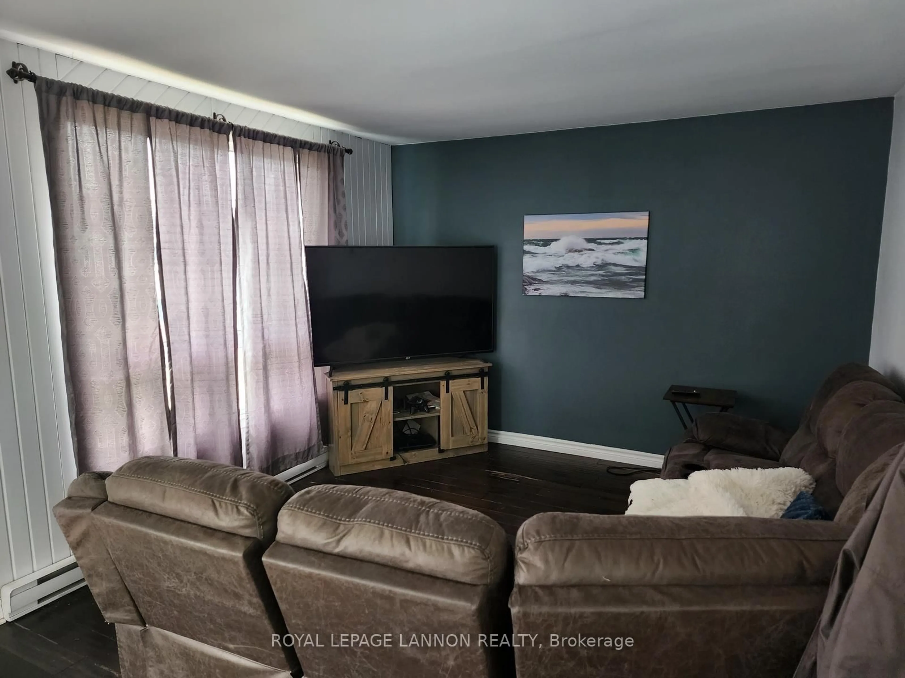Living room with furniture, wood/laminate floor for 94 LAKEVIEW Dr, Terrace Bay Ontario P0T 2W0