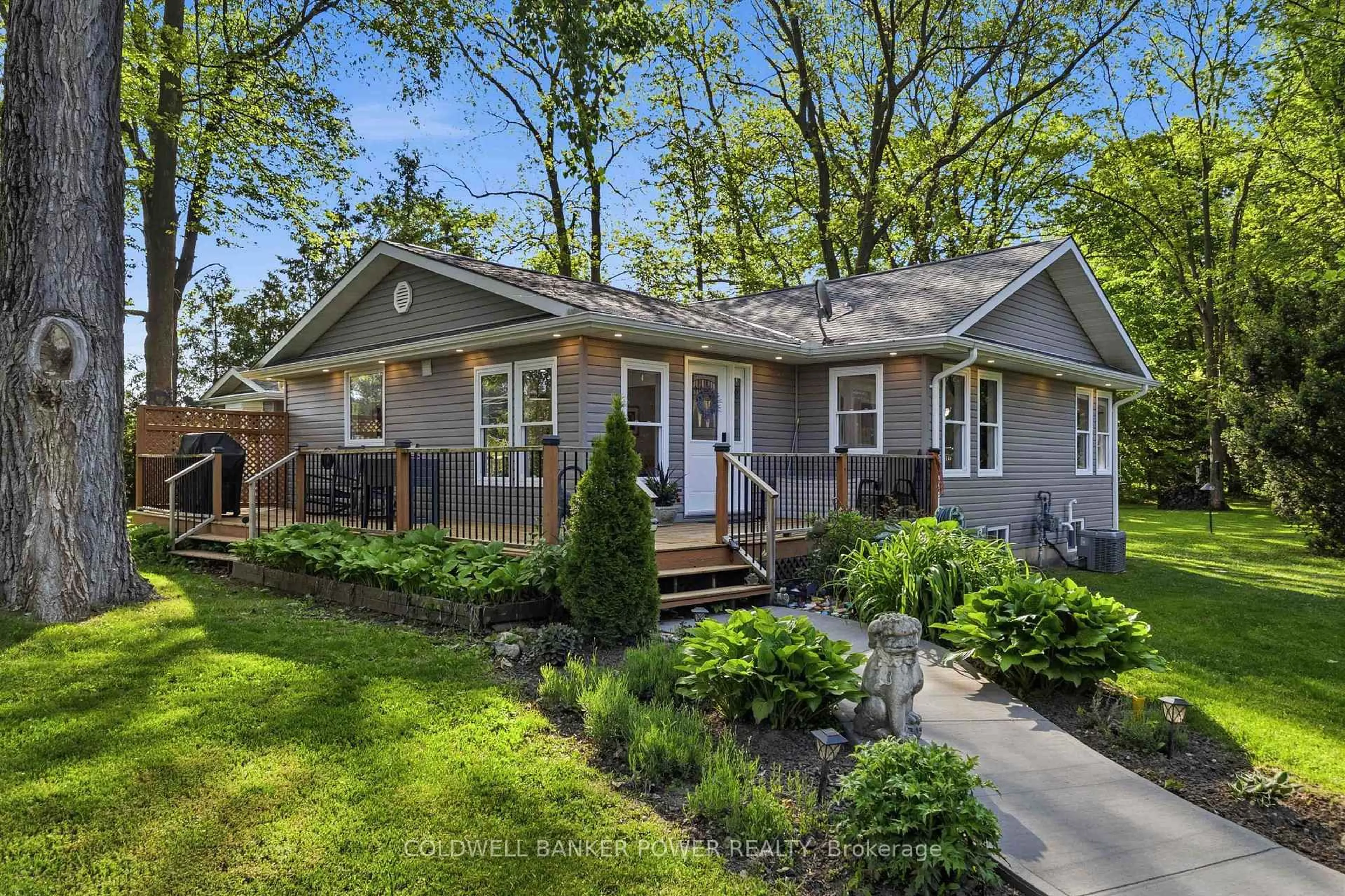 Home with vinyl exterior material, street for 26041 Queens Line, West Elgin Ontario N0L 2P0