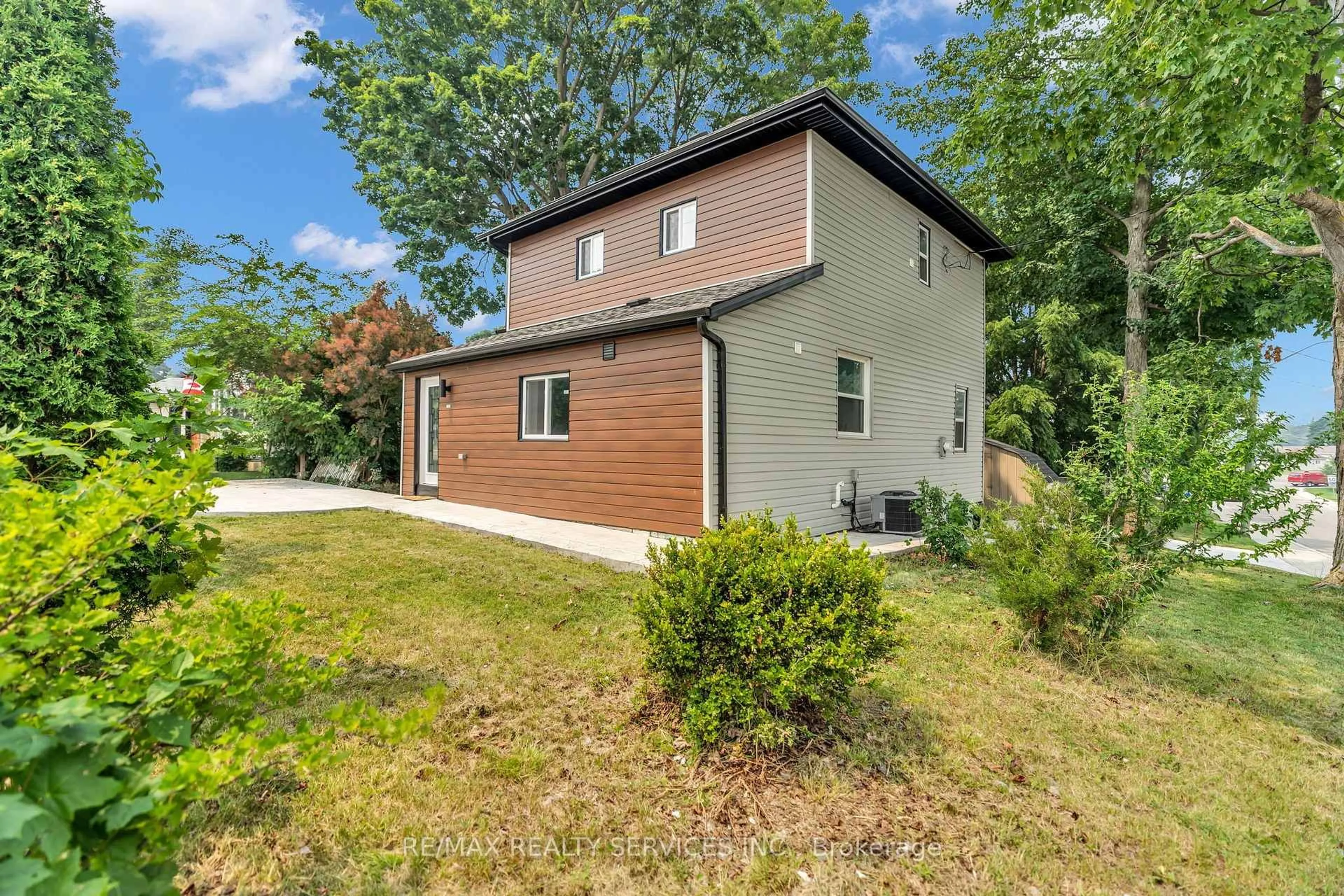 Home with brick exterior material, street for 727 College Ave, Woodstock Ontario N4S 2C7