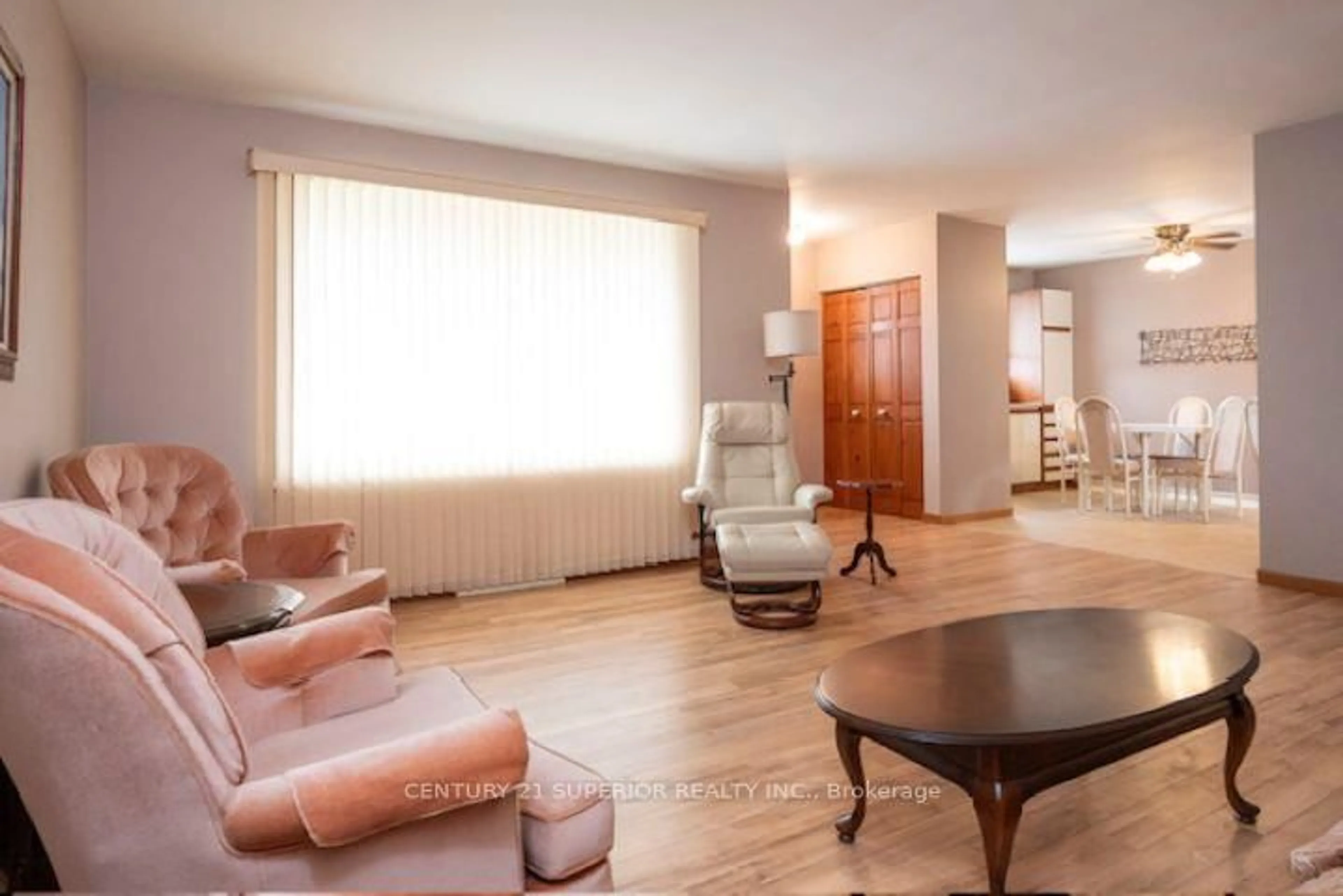 Living room with furniture, wood/laminate floor for 2608 Ridgeway Street, Thunder Bay Ontario P7E 5K3