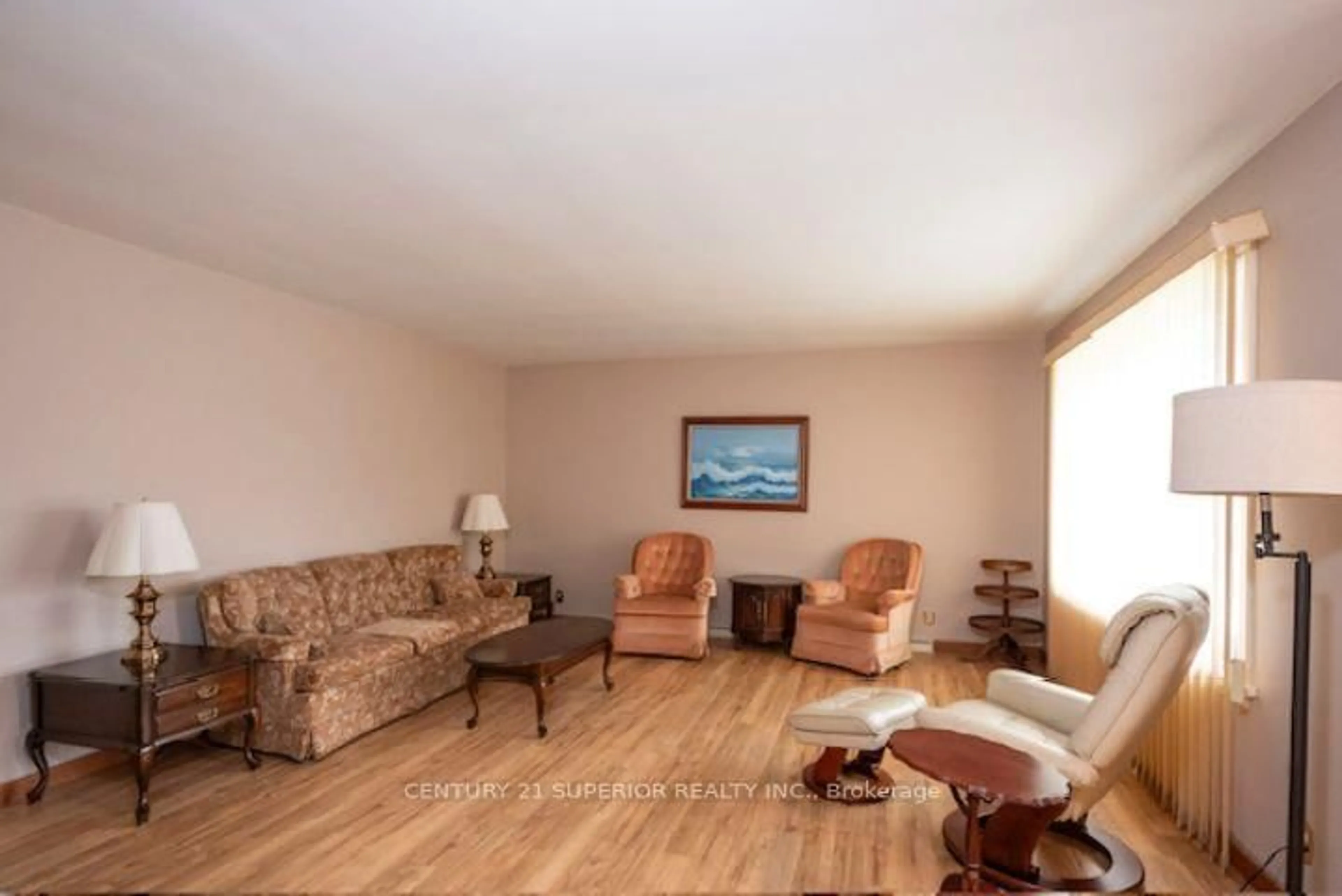 Living room with furniture, wood/laminate floor for 2608 Ridgeway Street, Thunder Bay Ontario P7E 5K3