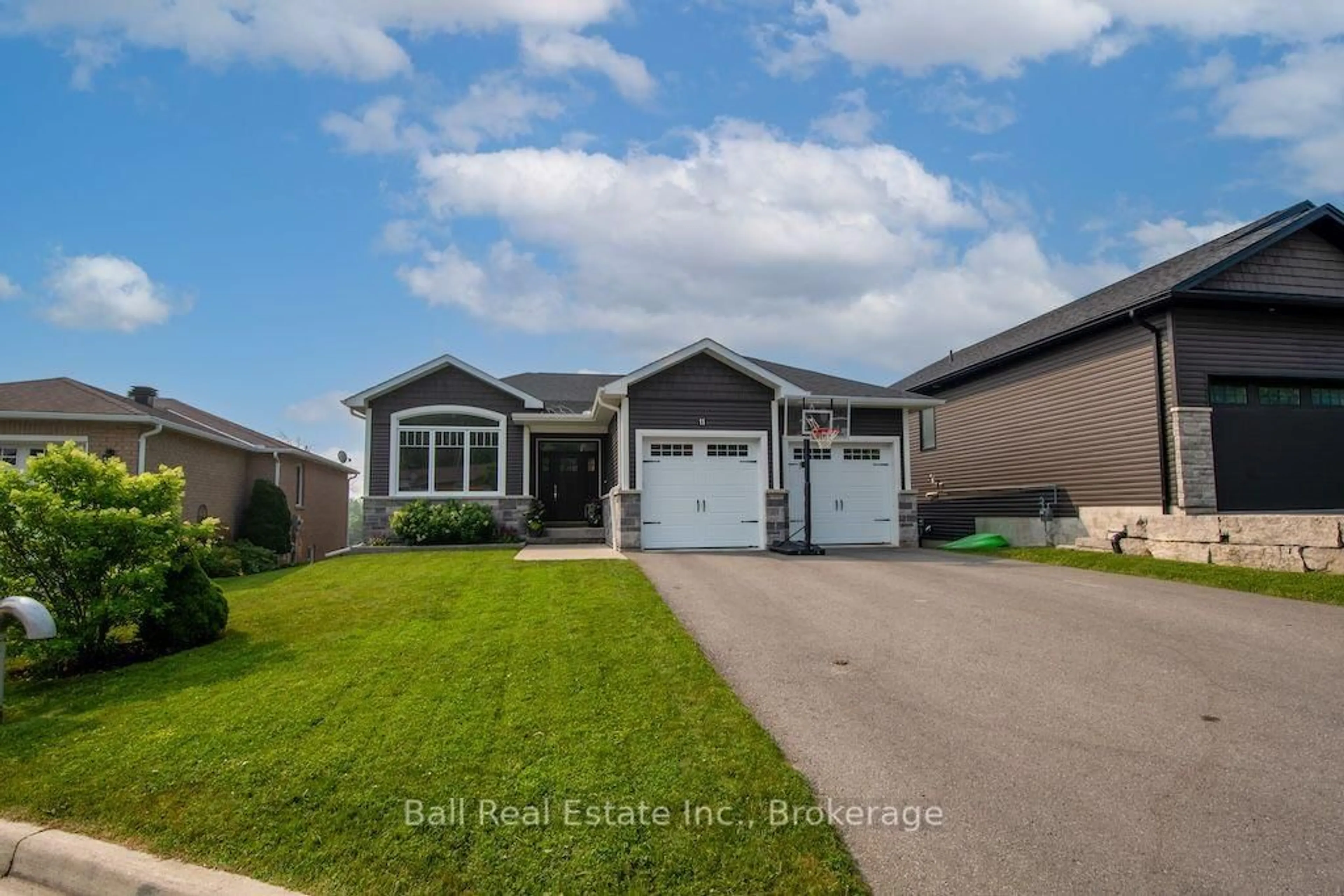 Home with vinyl exterior material, street for 11 Kingdon Ave, Selwyn Ontario K0L 2H0