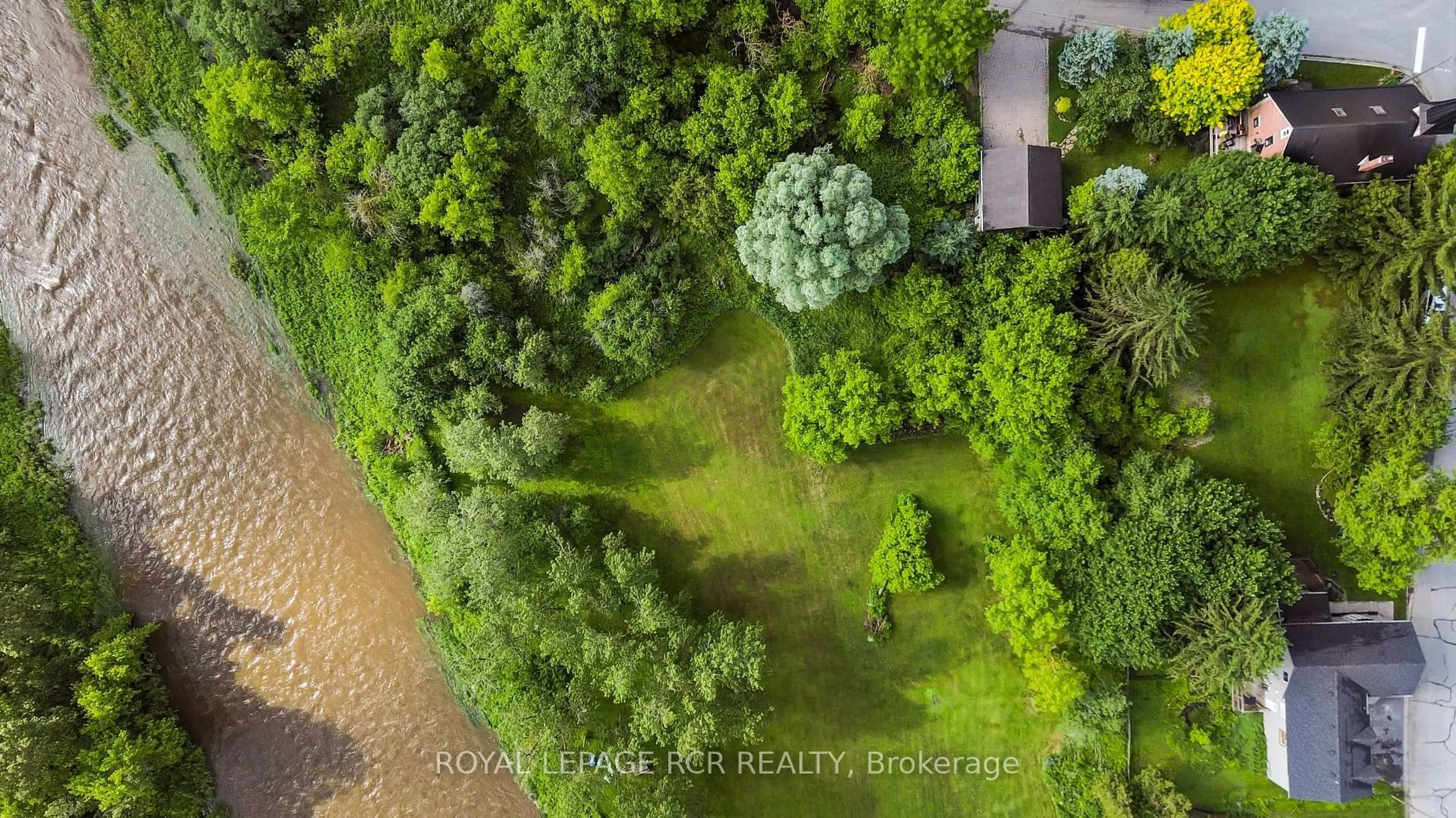A pic from outside/outdoor area/front of a property/back of a property/a pic from drone, water/lake/river/ocean view for 12 Mill St, Amaranth Ontario L9W 3Z3