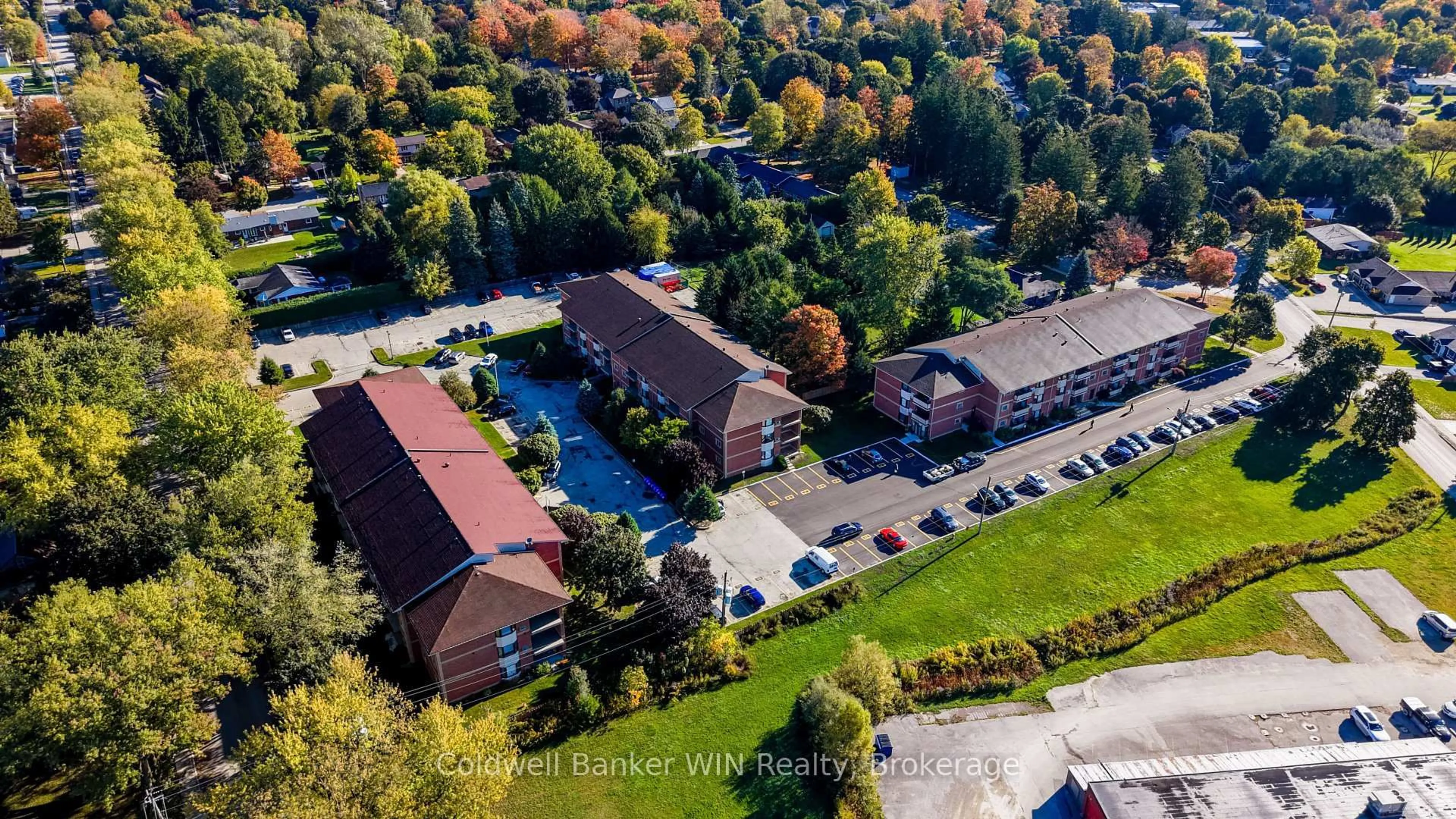 A pic from outside/outdoor area/front of a property/back of a property/a pic from drone, mountain view for 440 Durham St #306, Wellington North Ontario N0G 2L1