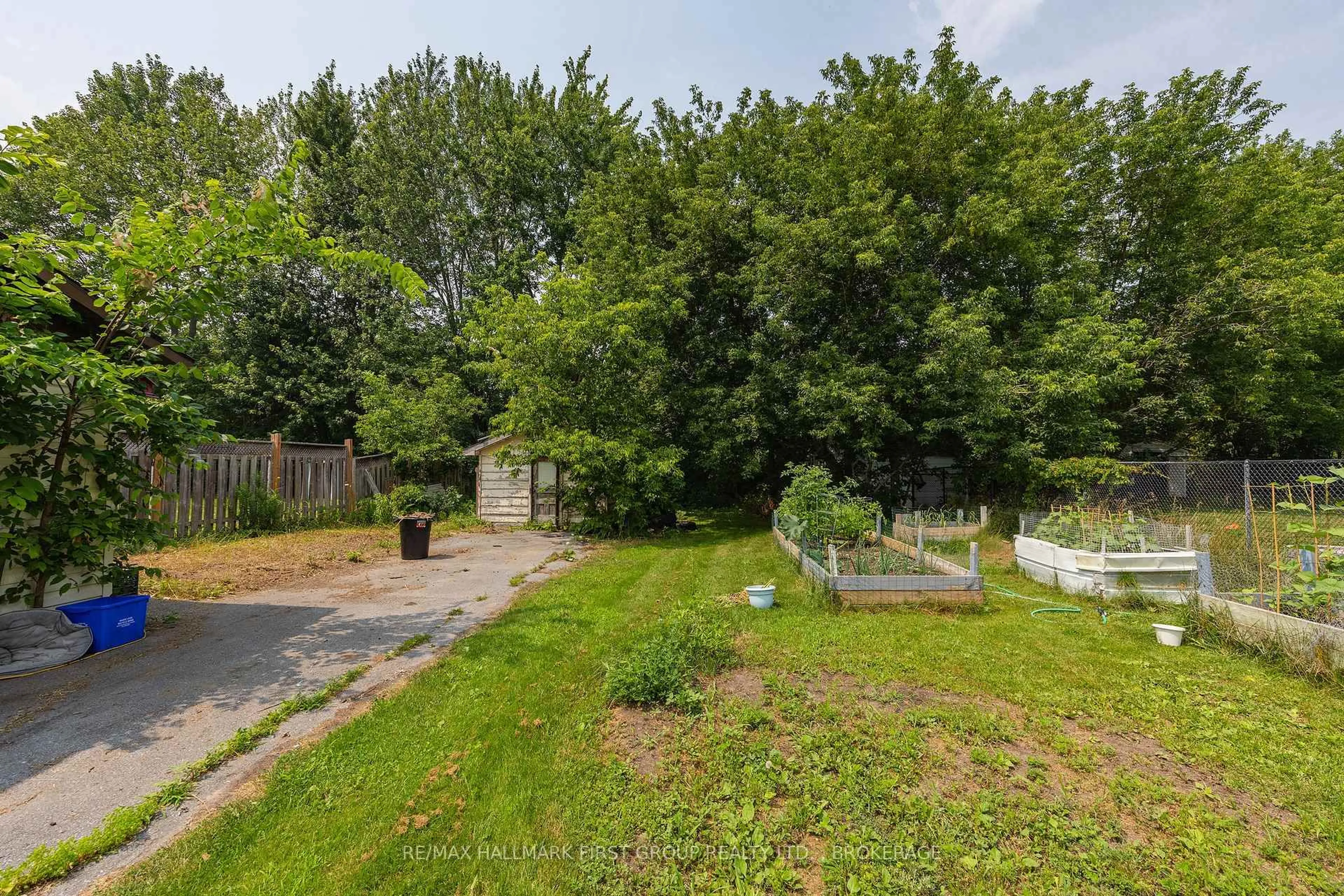 A pic from outside/outdoor area/front of a property/back of a property/a pic from drone, forest/trees view for 469 Absalom Rd, Bath Ontario K0H 1G0