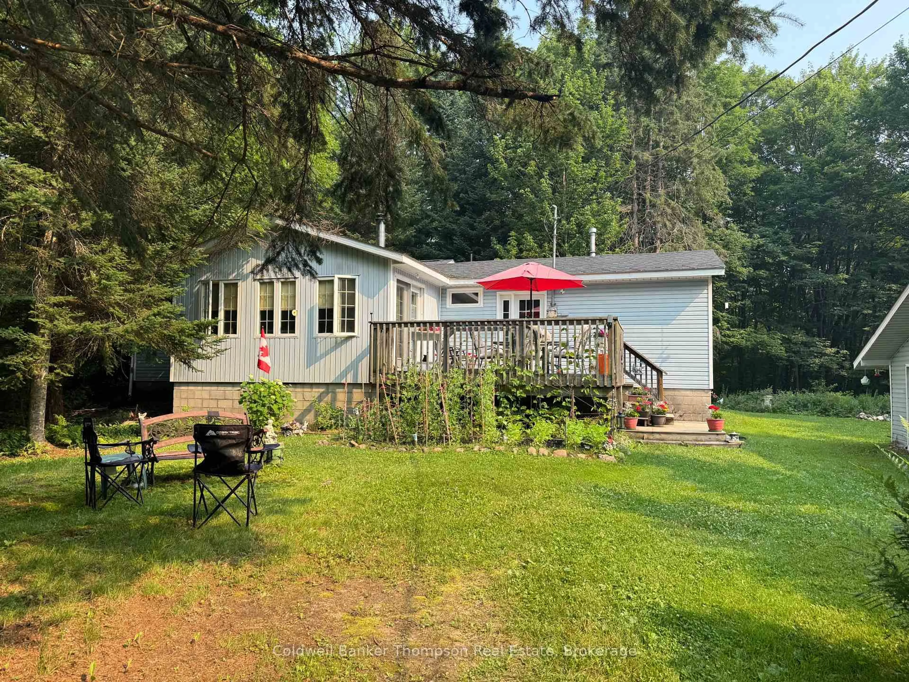 A pic from outside/outdoor area/front of a property/back of a property/a pic from drone, water/lake/river/ocean view for 3664 Highway 518 Highway, McMurrich/Monteith Ontario P0A 1Y0