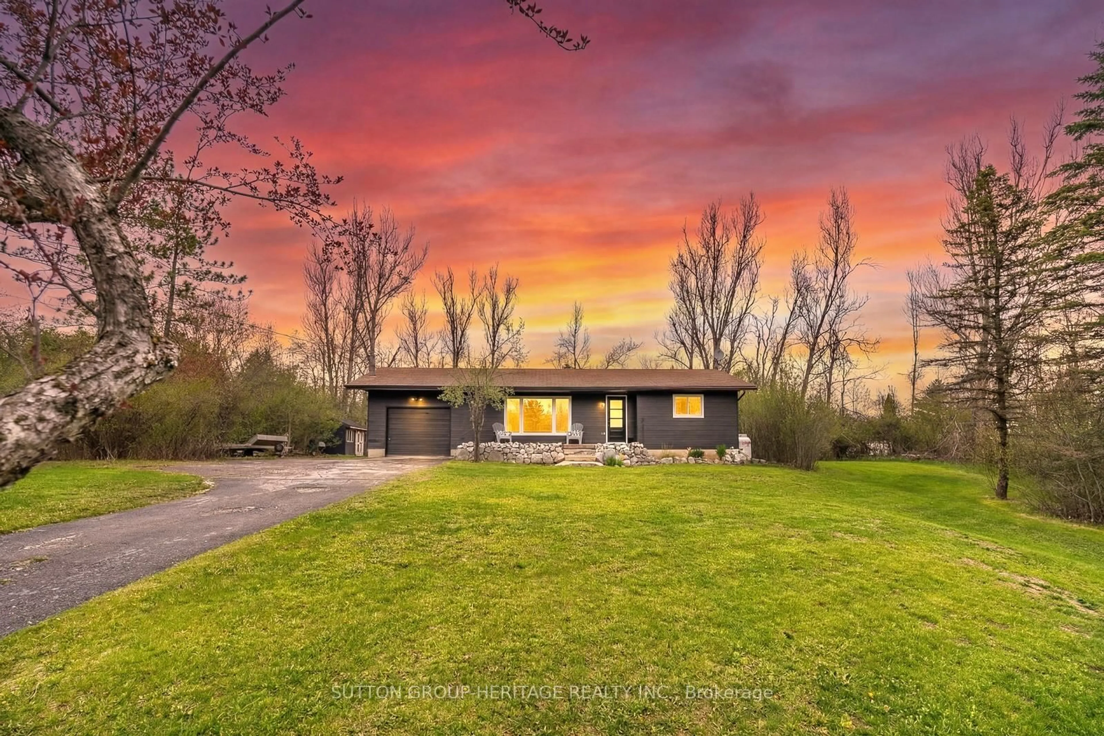 A pic from outside/outdoor area/front of a property/back of a property/a pic from drone, unknown for 11 Swiss Cres, Trent Lakes Ontario K0M 1A0