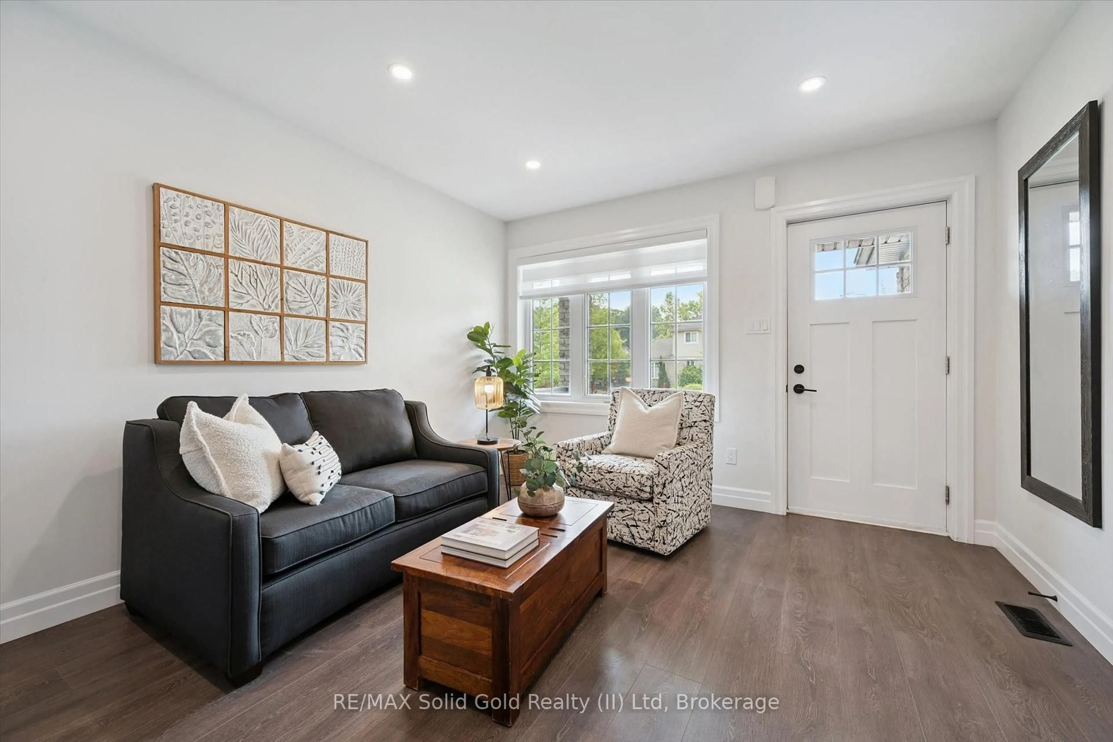 Living room with furniture, unknown for 142 Marl Meadow Dr, Kitchener Ontario N2R 1L3