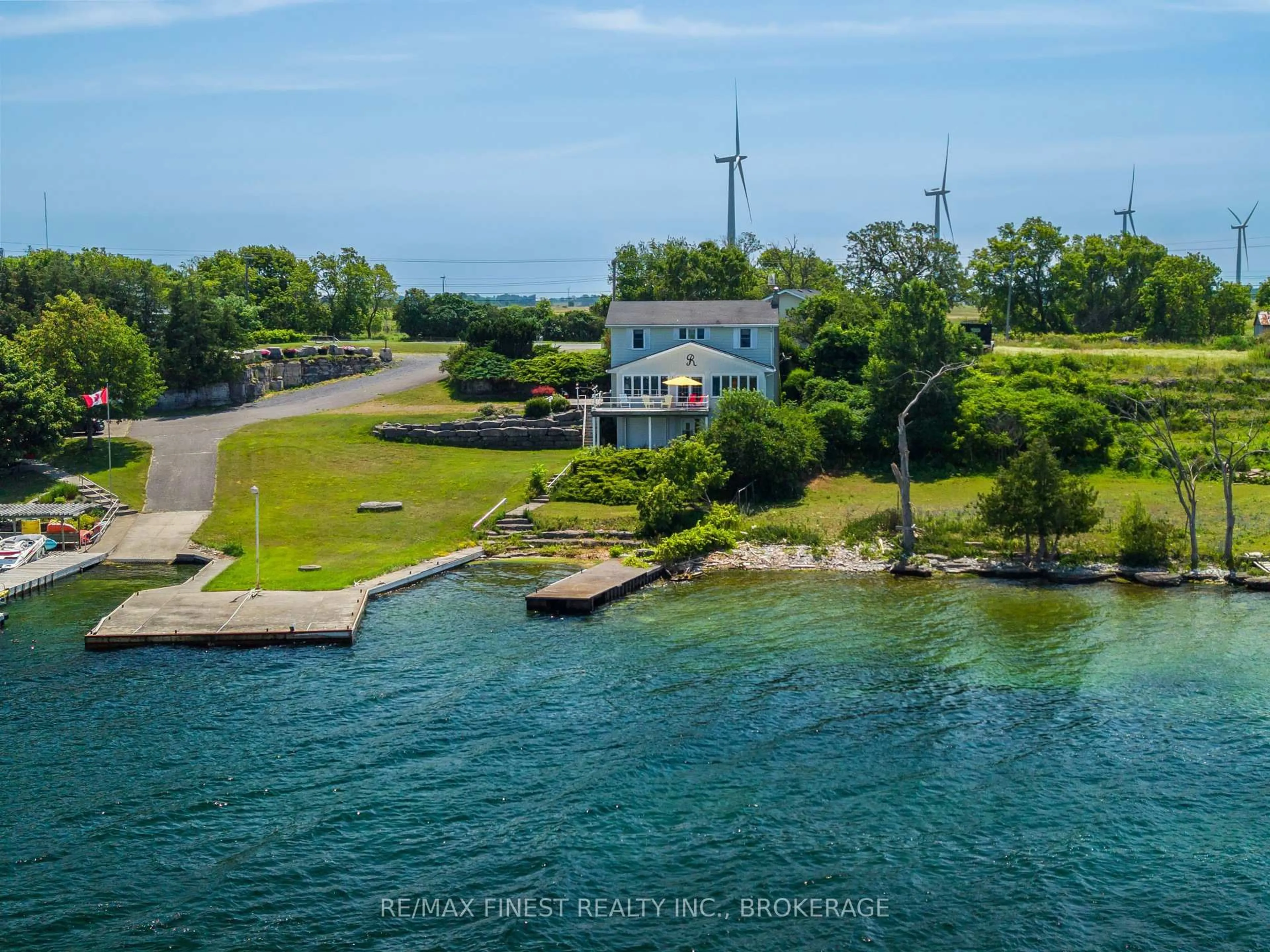 A pic from outside/outdoor area/front of a property/back of a property/a pic from drone, water/lake/river/ocean view for 396 HIGHWAY 96, Wolfe Island Ontario K0H 2Y0