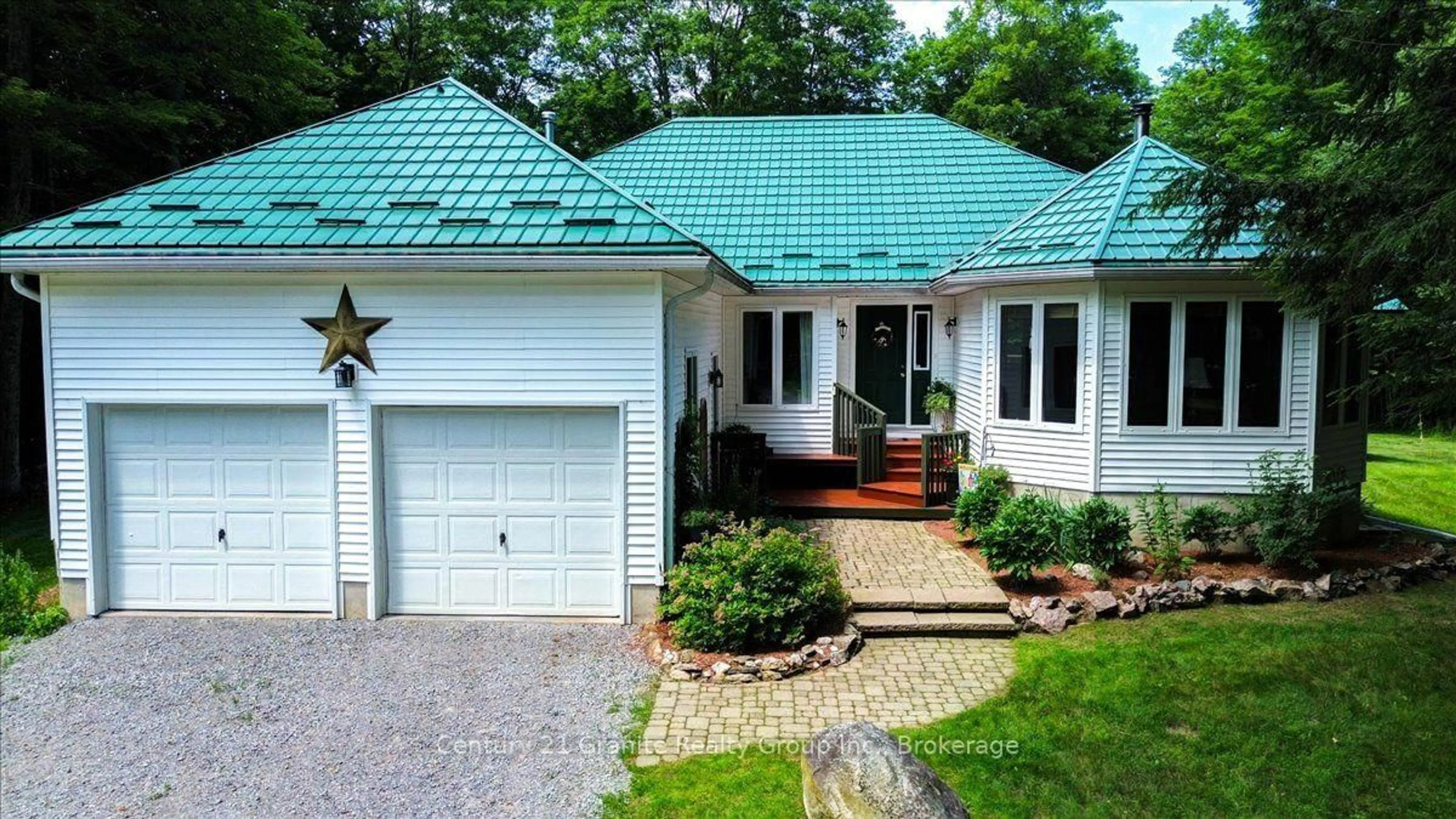Home with vinyl exterior material, street for 1132 Irish Line Rd, Dysart et al Ontario K0M 1S0