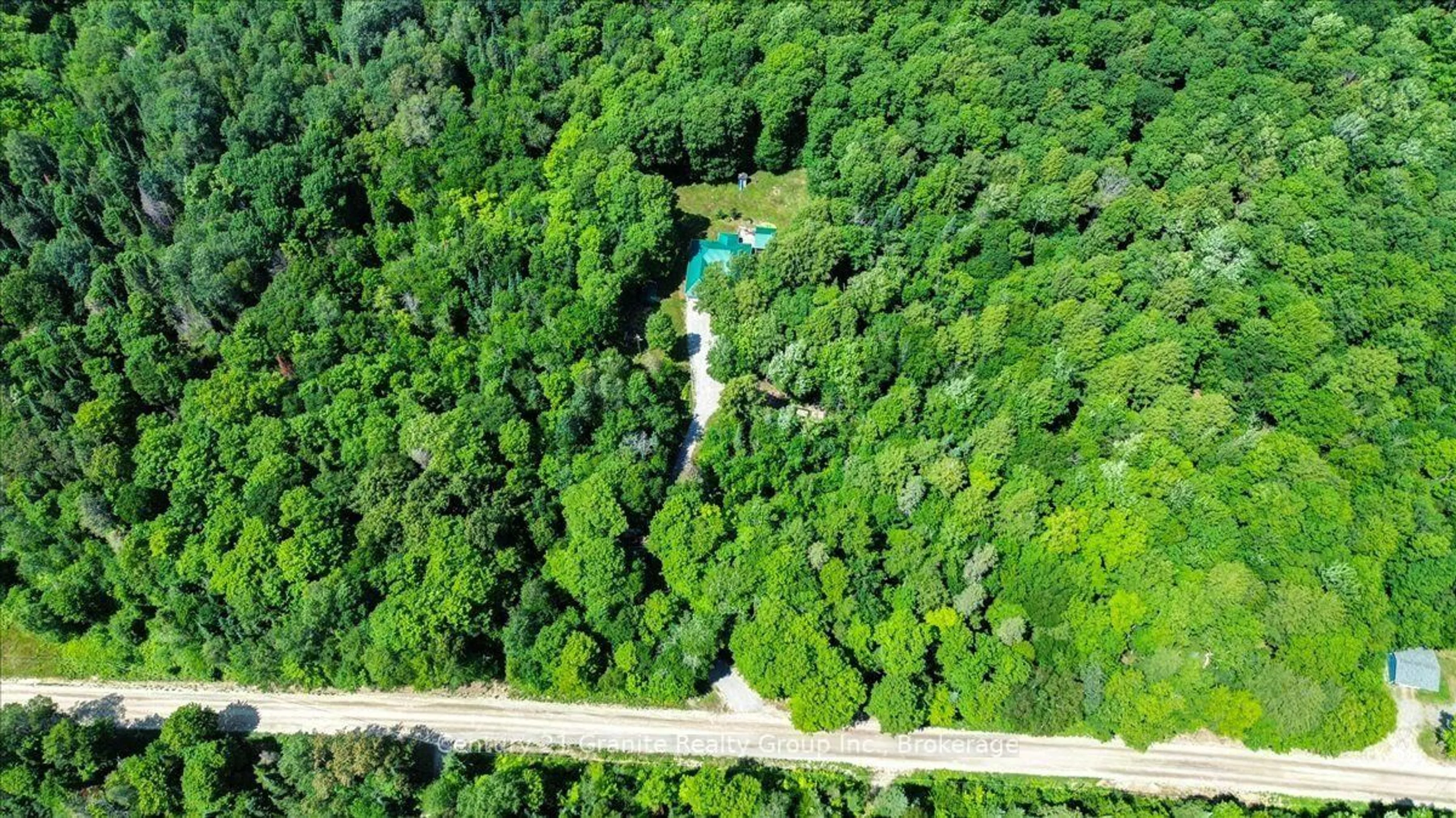 A pic from outside/outdoor area/front of a property/back of a property/a pic from drone, forest/trees view for 1132 Irish Line Rd, Dysart et al Ontario K0M 1S0