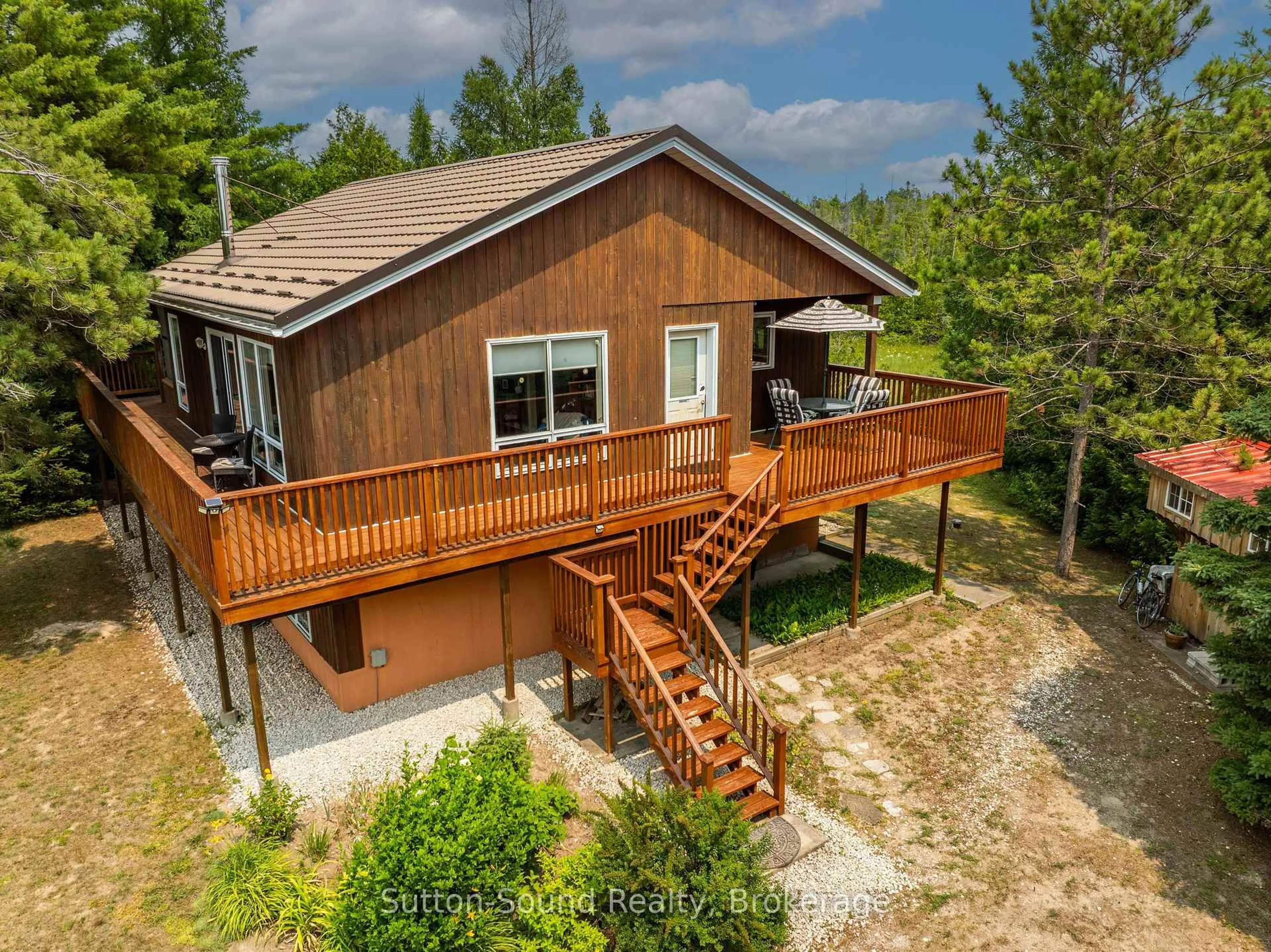 A pic from outside/outdoor area/front of a property/back of a property/a pic from drone, unknown for 219 Bay St. St, South Bruce Peninsula Ontario N0H 2T0