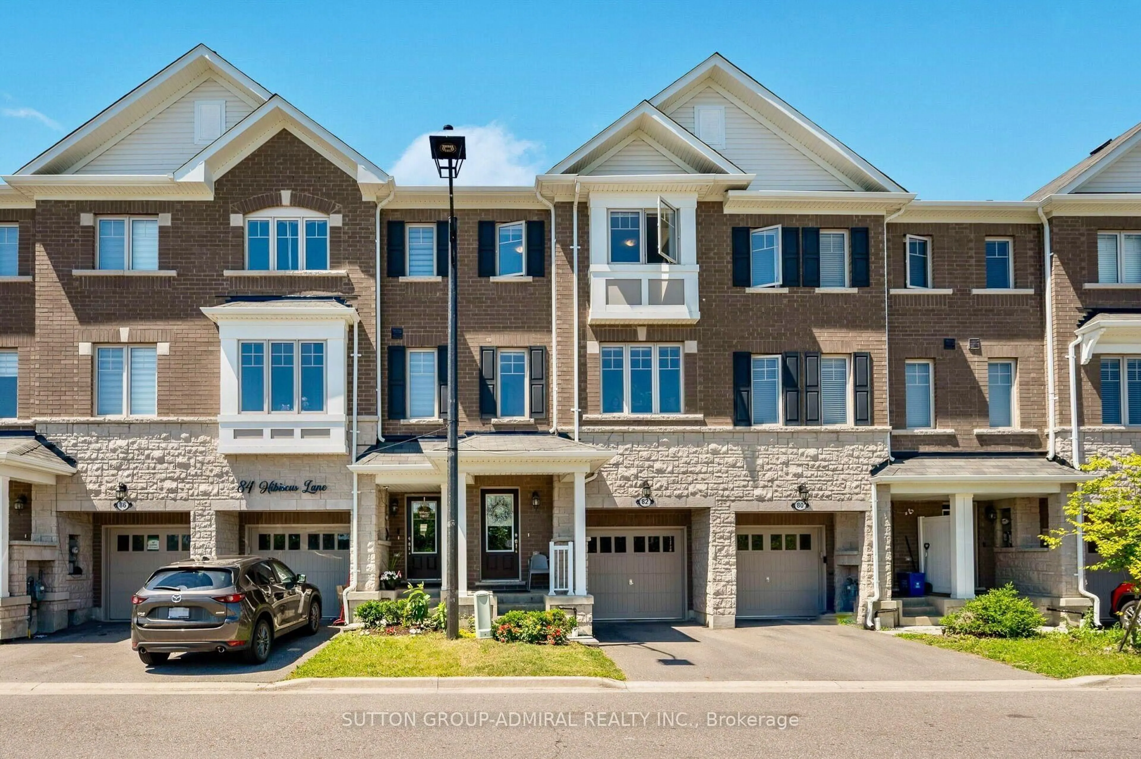 Home with brick exterior material, street for 82 Hibiscus Lane, Hamilton Ontario L8K 5J3
