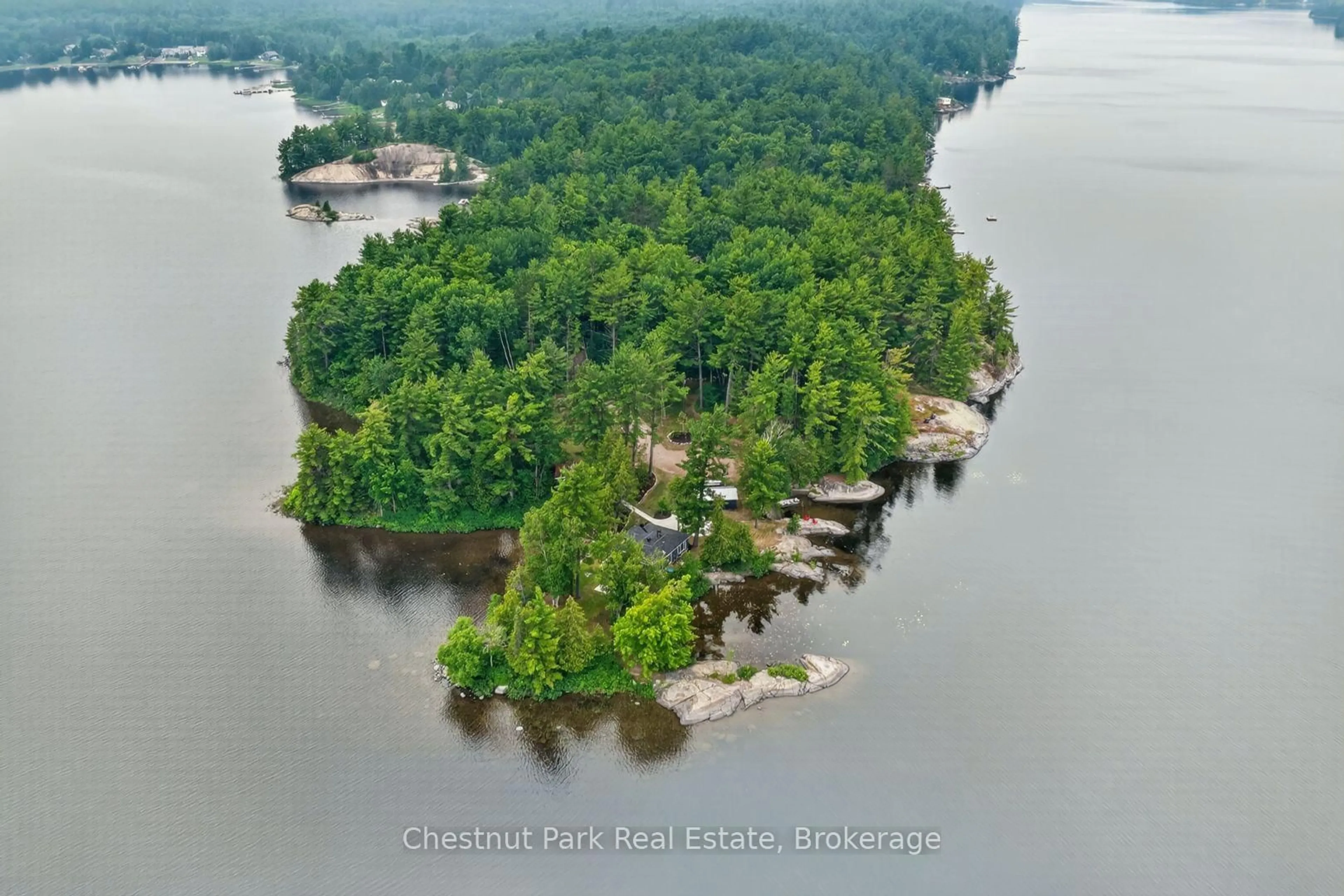 A pic from outside/outdoor area/front of a property/back of a property/a pic from drone, water/lake/river/ocean view for 357 Whip Poor Will Rd, French River Ontario P0M 1A0