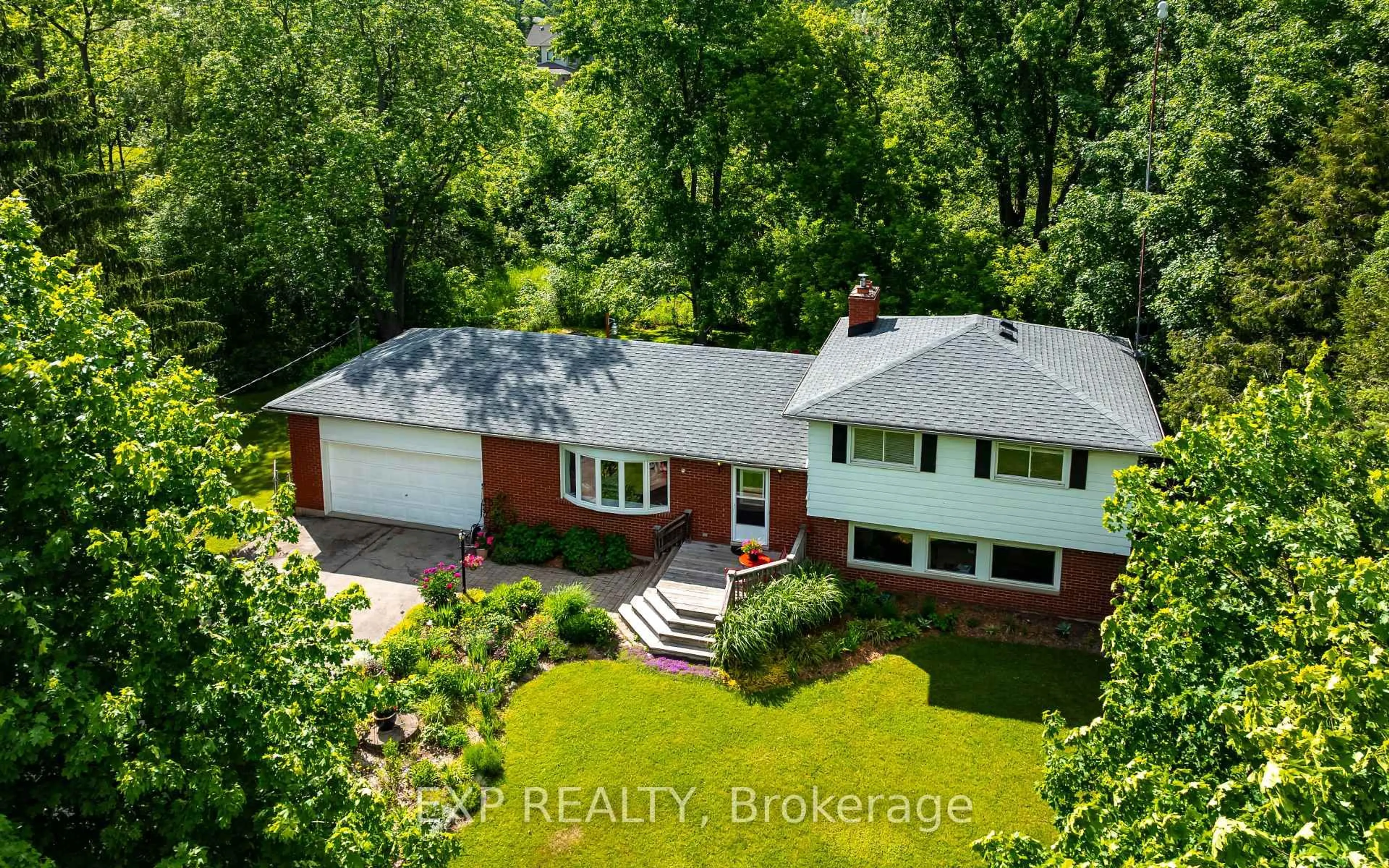 A pic from outside/outdoor area/front of a property/back of a property/a pic from drone, street for 9410 Wellington Rd 42, Erin Ontario N0B 1H0