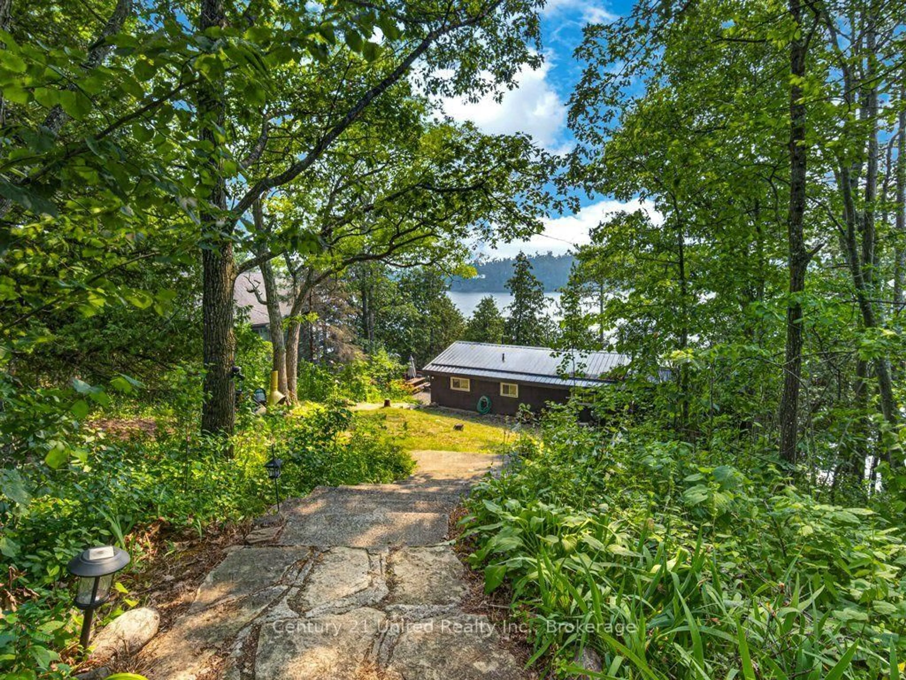 A pic from outside/outdoor area/front of a property/back of a property/a pic from drone, water/lake/river/ocean view for 24 Bedwell Dr, North Kawartha Ontario K0L 3E0
