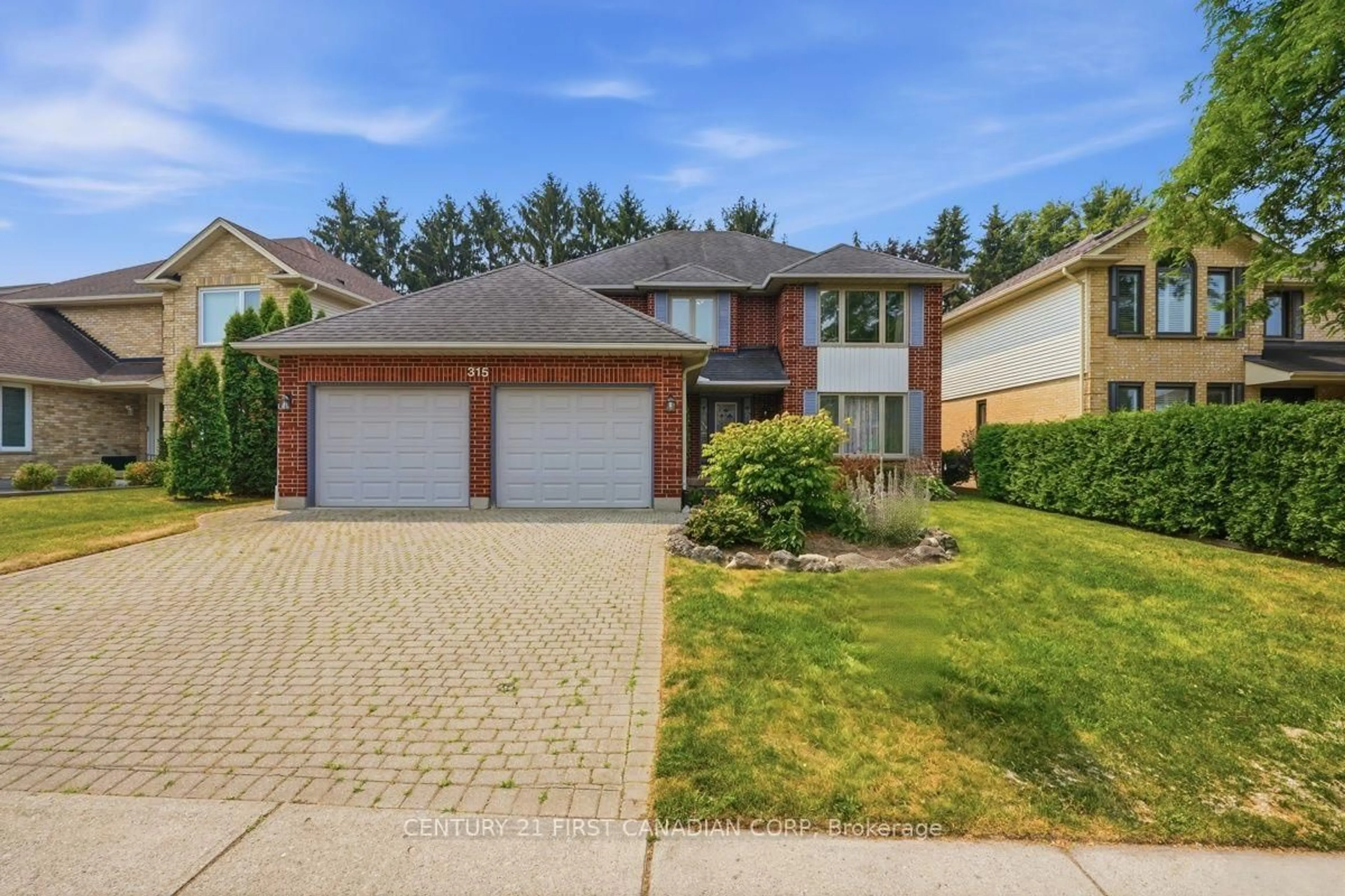 Home with brick exterior material, street for 315 Ambleside Dr, London North Ontario N6G 4V8
