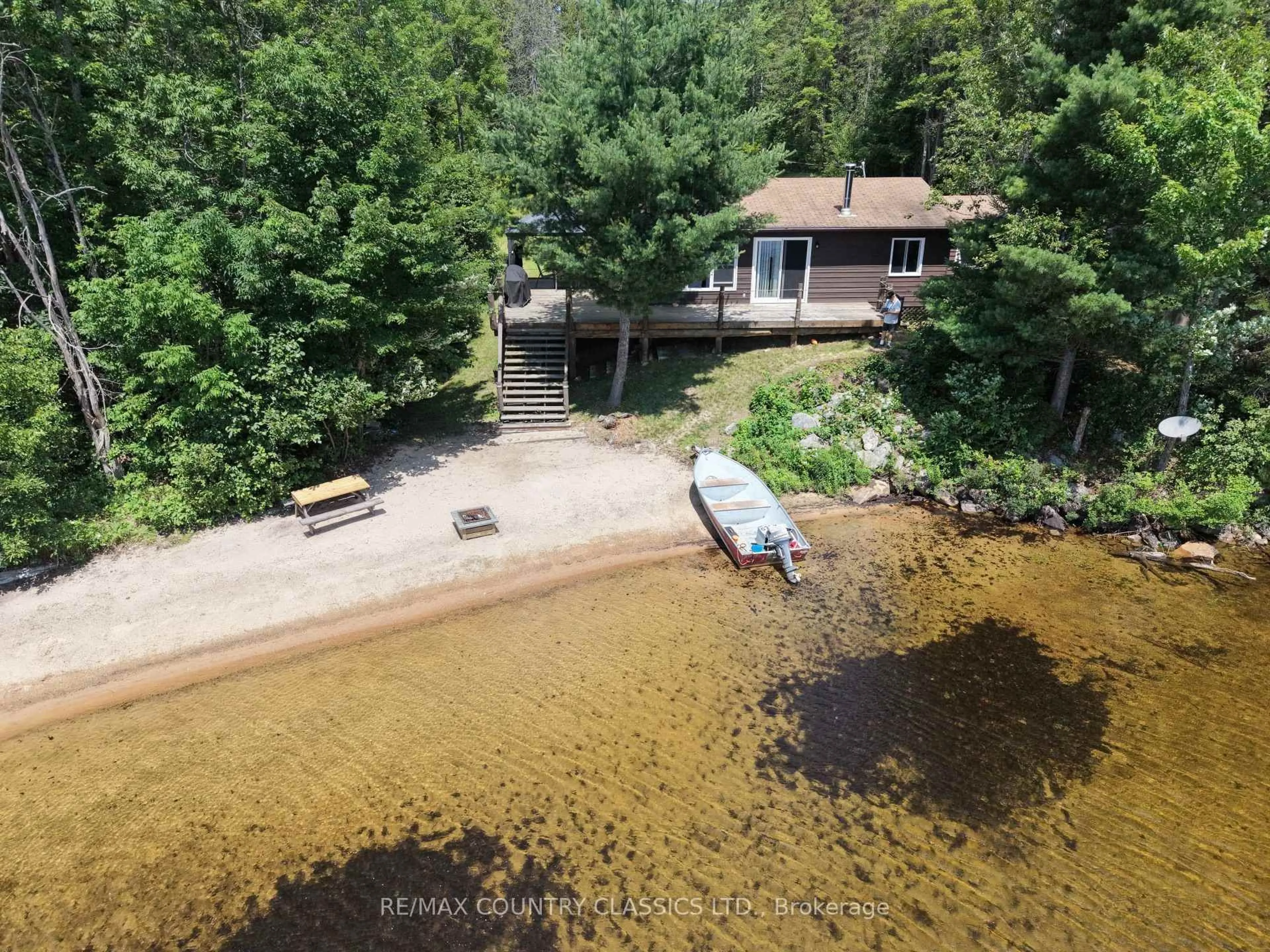 A pic from outside/outdoor area/front of a property/back of a property/a pic from drone, water/lake/river/ocean view for 1483 Wilowski Dr, Barry's Bay Ontario K0J 1B0