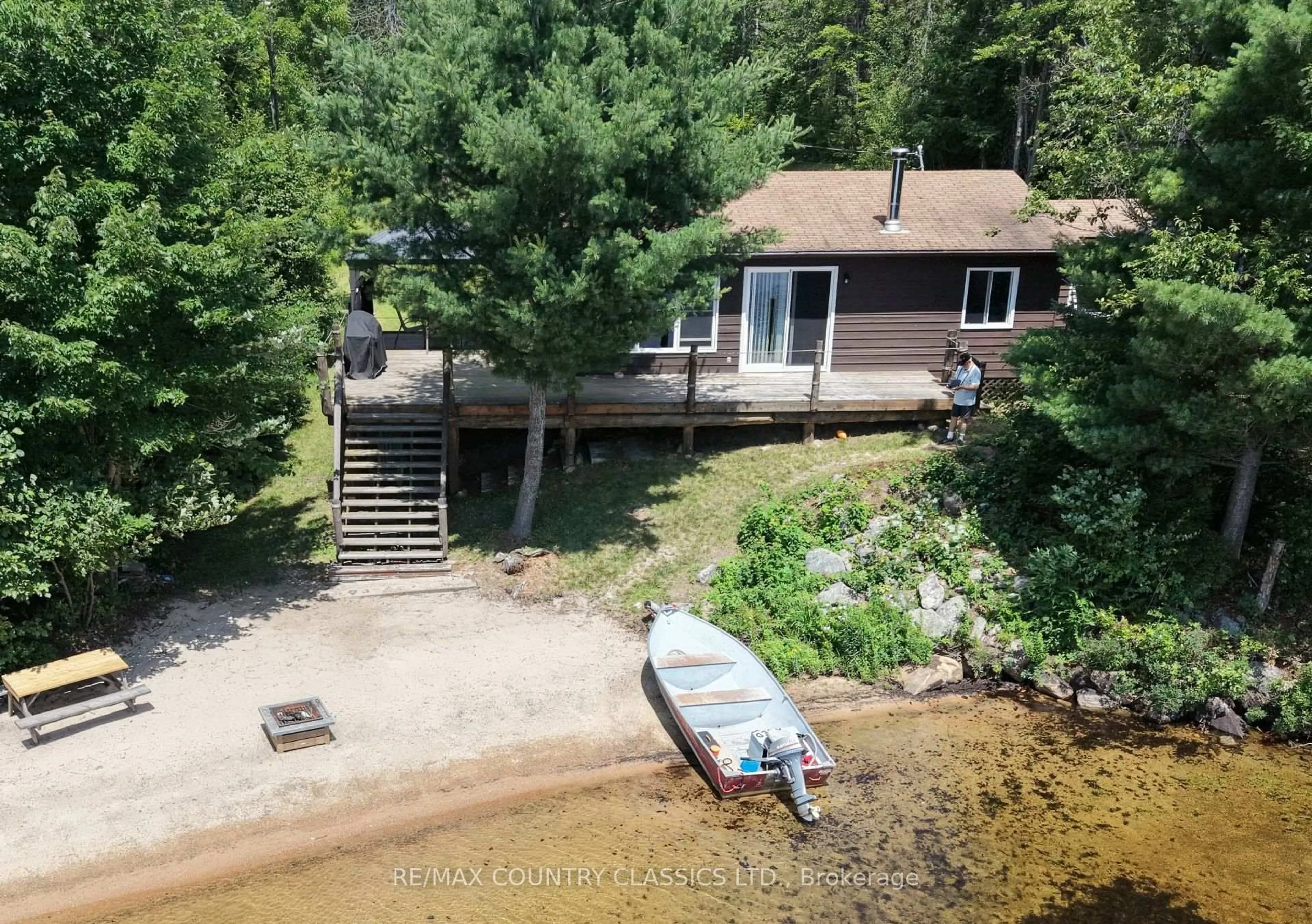 A pic from outside/outdoor area/front of a property/back of a property/a pic from drone, water/lake/river/ocean view for 1483 Wilowski Dr, Barry's Bay Ontario K0J 1B0