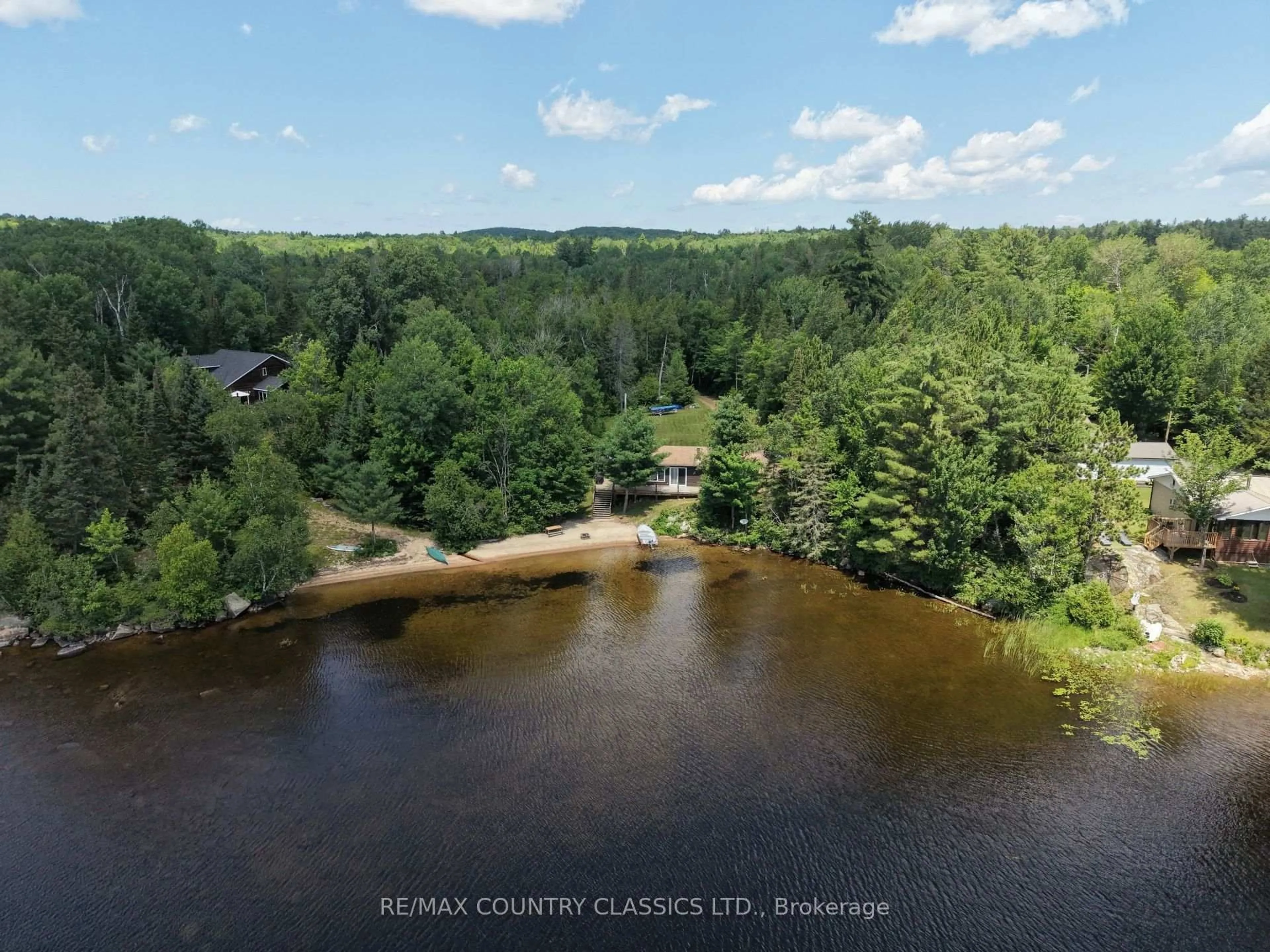 A pic from outside/outdoor area/front of a property/back of a property/a pic from drone, water/lake/river/ocean view for 1483 Wilowski Dr, Barry's Bay Ontario K0J 1B0