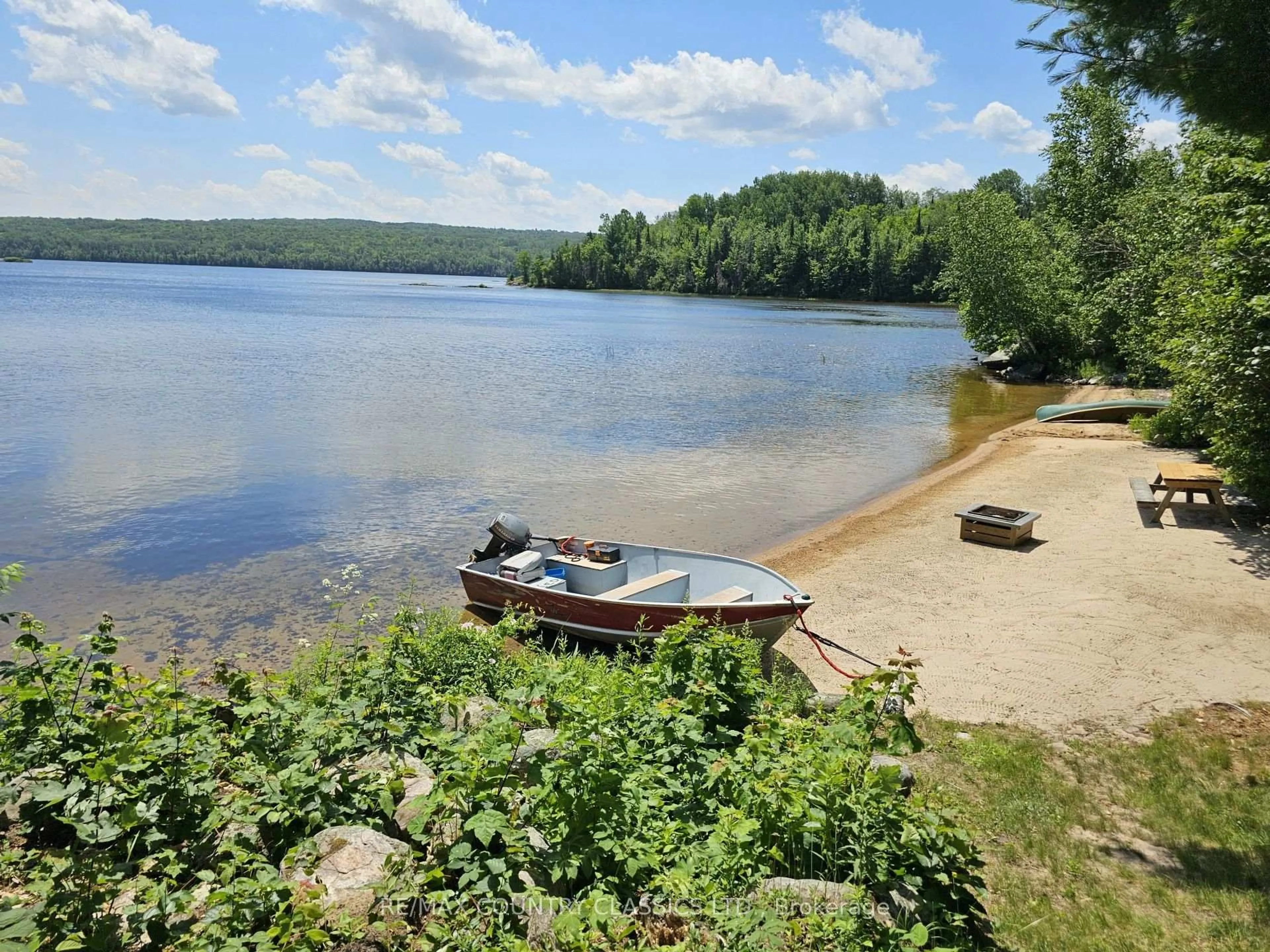 A pic from outside/outdoor area/front of a property/back of a property/a pic from drone, water/lake/river/ocean view for 1483 Wilowski Dr, Barry's Bay Ontario K0J 1B0