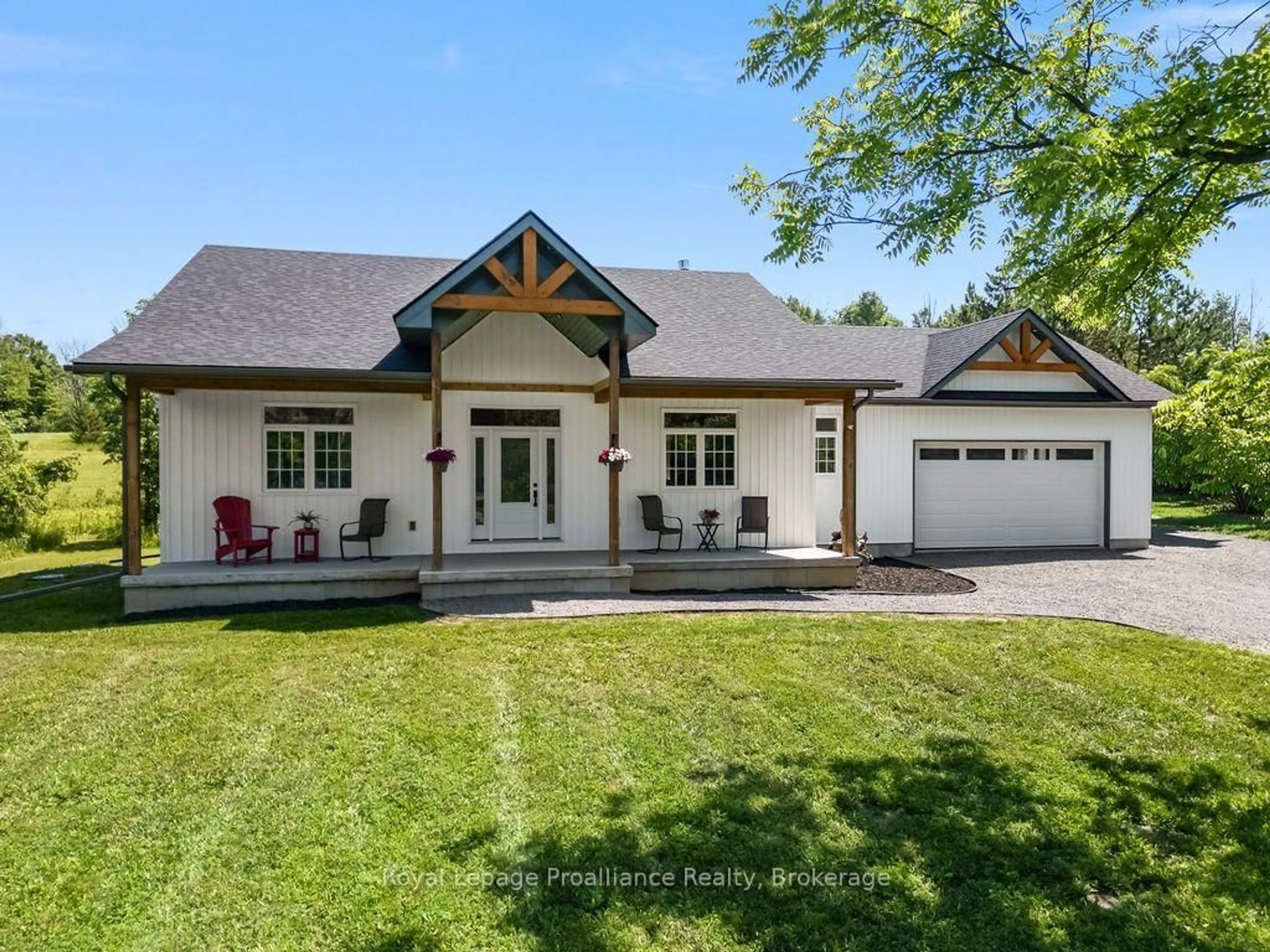 Home with vinyl exterior material, street for 556 Marsh Hill Rd, Stirling Ontario K0K 3E0