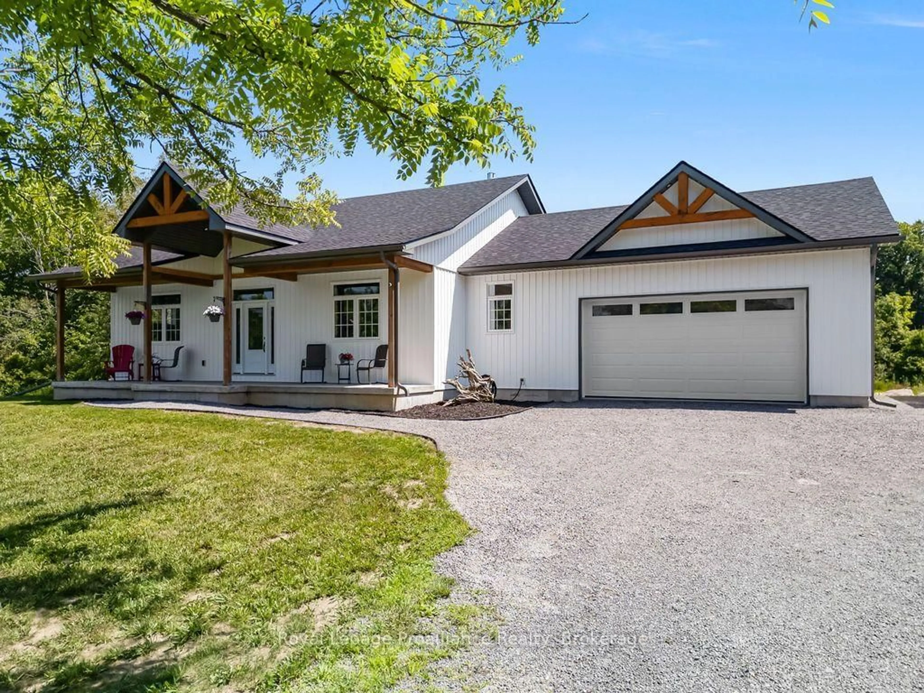 Home with vinyl exterior material, street for 556 Marsh Hill Rd, Stirling Ontario K0K 3E0