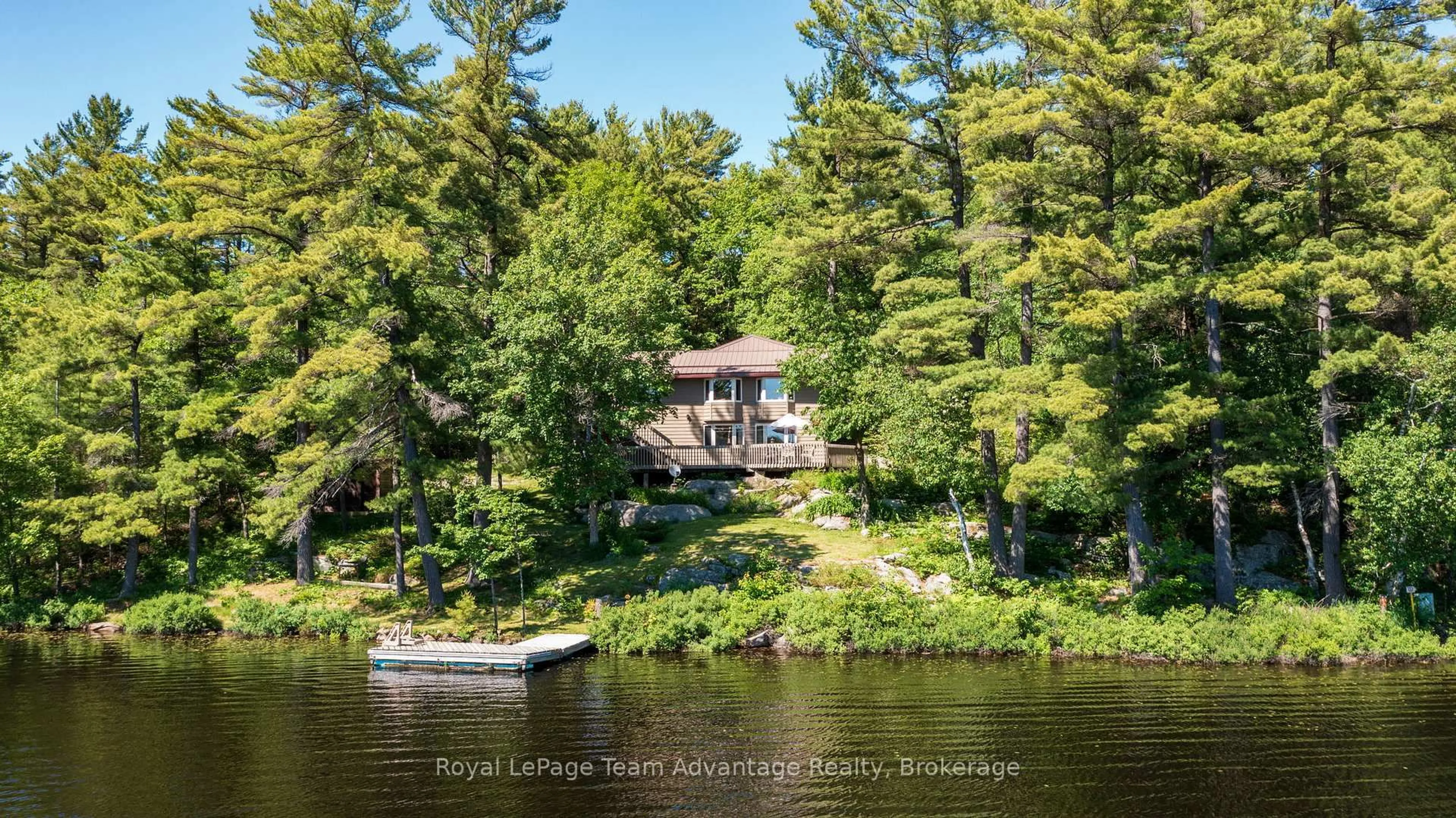 A pic from outside/outdoor area/front of a property/back of a property/a pic from drone, water/lake/river/ocean view for 39 Wood Duck Tr, The Archipelago Ontario P0G 1K0