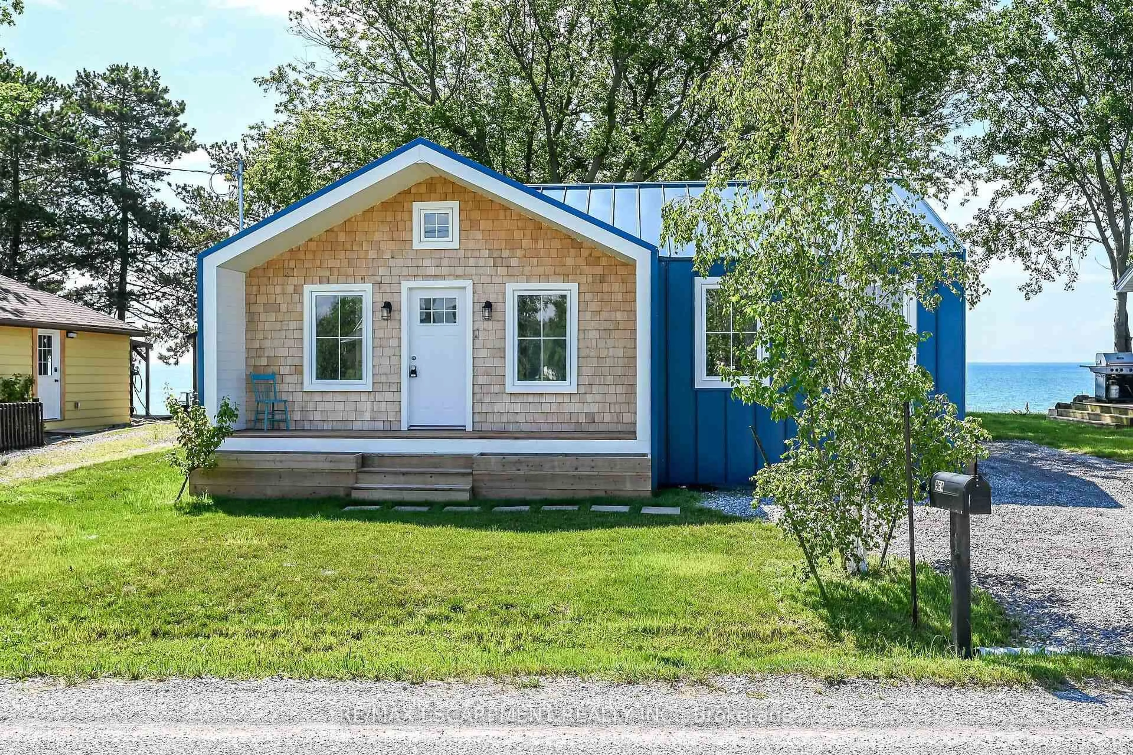 Home with vinyl exterior material, street for 964 South Coast Dr, Haldimand Ontario N0A 1L0
