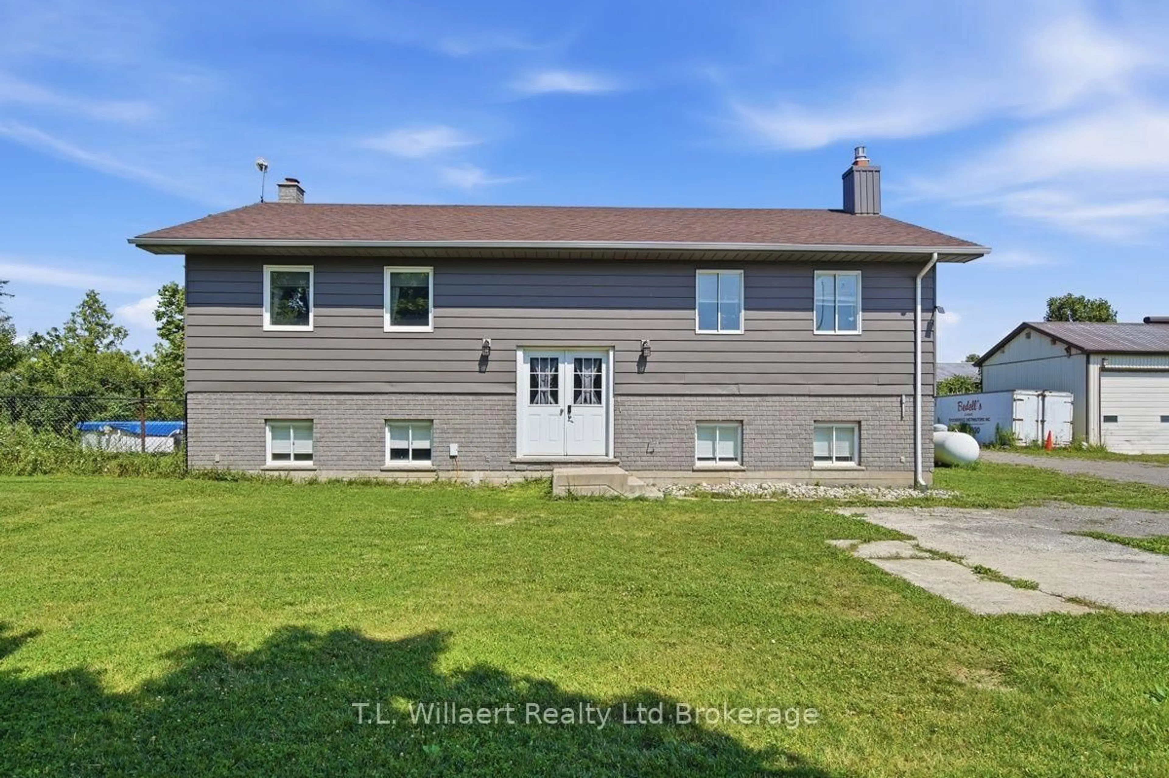 A pic from outside/outdoor area/front of a property/back of a property/a pic from drone, water/lake/river/ocean view for 25130 Argyle Line, West Elgin Ontario N0L 2P0