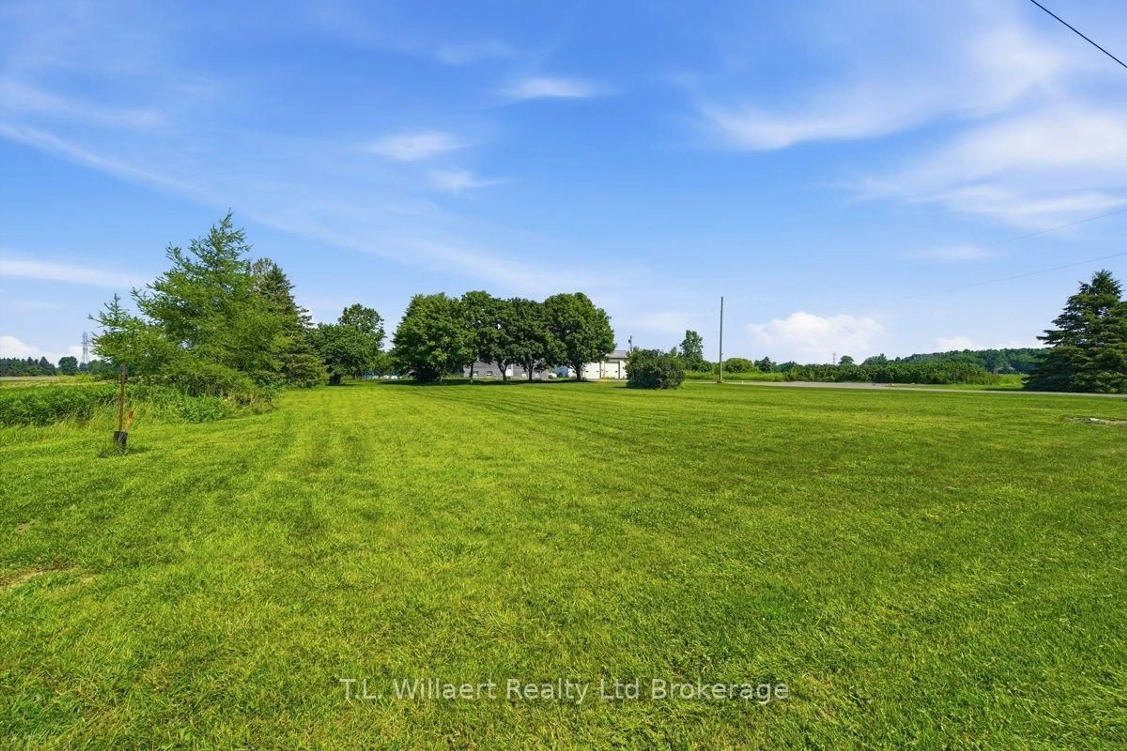 A pic from outside/outdoor area/front of a property/back of a property/a pic from drone, water/lake/river/ocean view for 25130 Argyle Line, West Elgin Ontario N0L 2P0