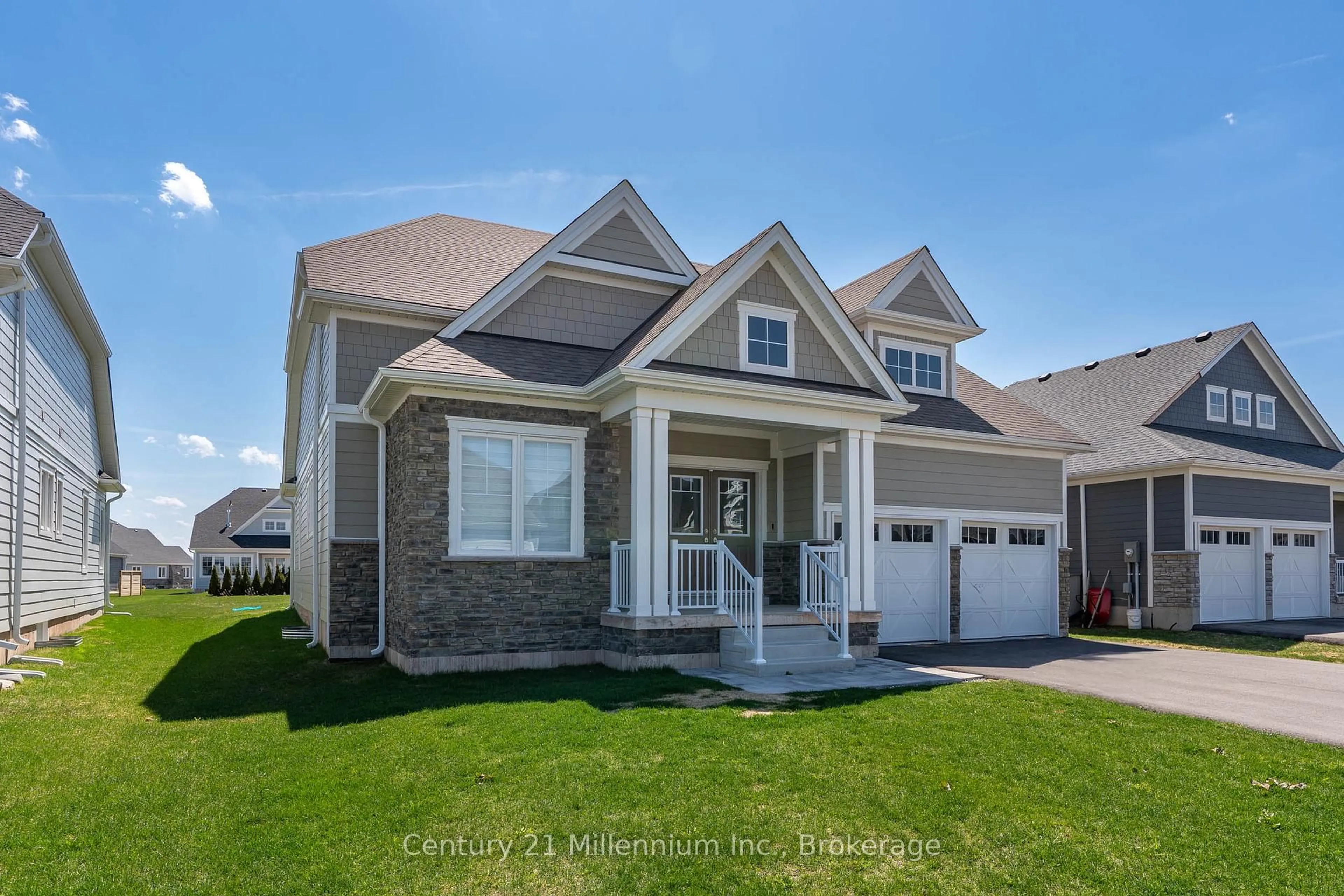 Home with vinyl exterior material, street for 103 Laurens Lane, Georgian Bluffs Ontario N0H 1S0