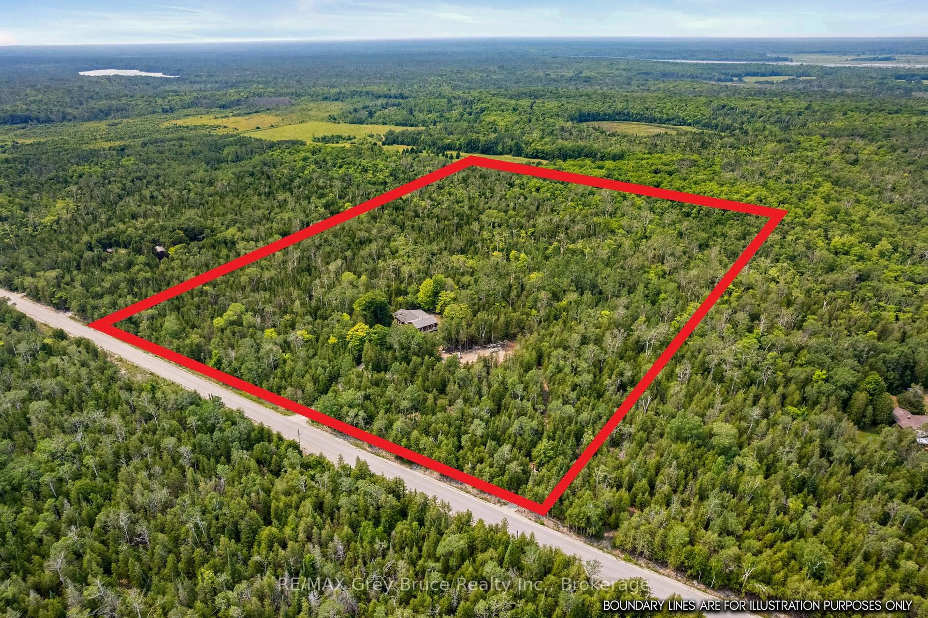 A pic from outside/outdoor area/front of a property/back of a property/a pic from drone, forest/trees view for 479 DYERS BAY Rd, Northern Bruce Peninsula Ontario N0H 1Z0