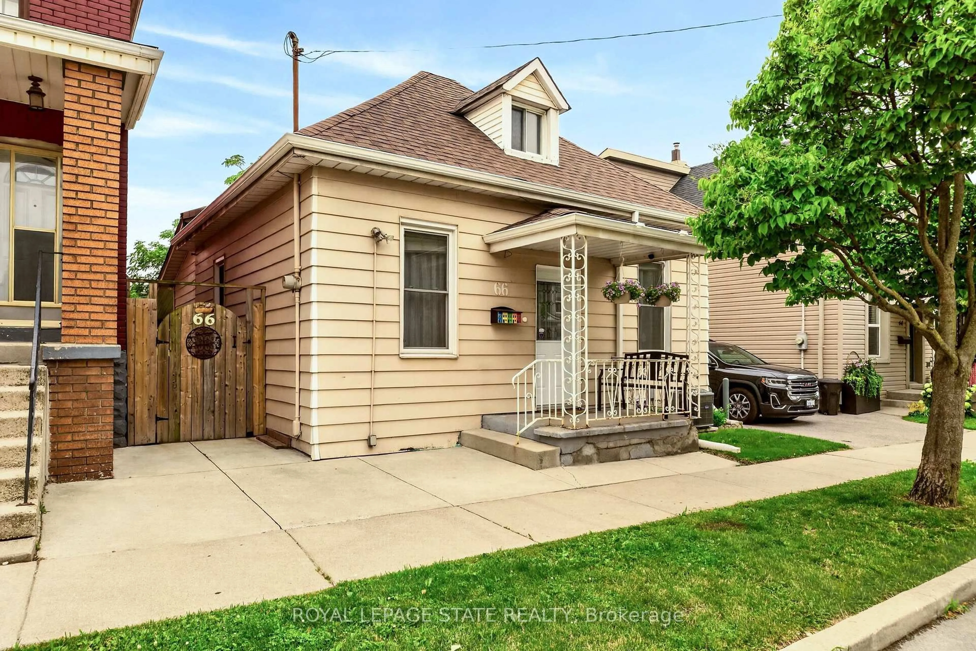 Home with brick exterior material, street for 66 Beechwood Ave, Hamilton Ontario L8L 2S4