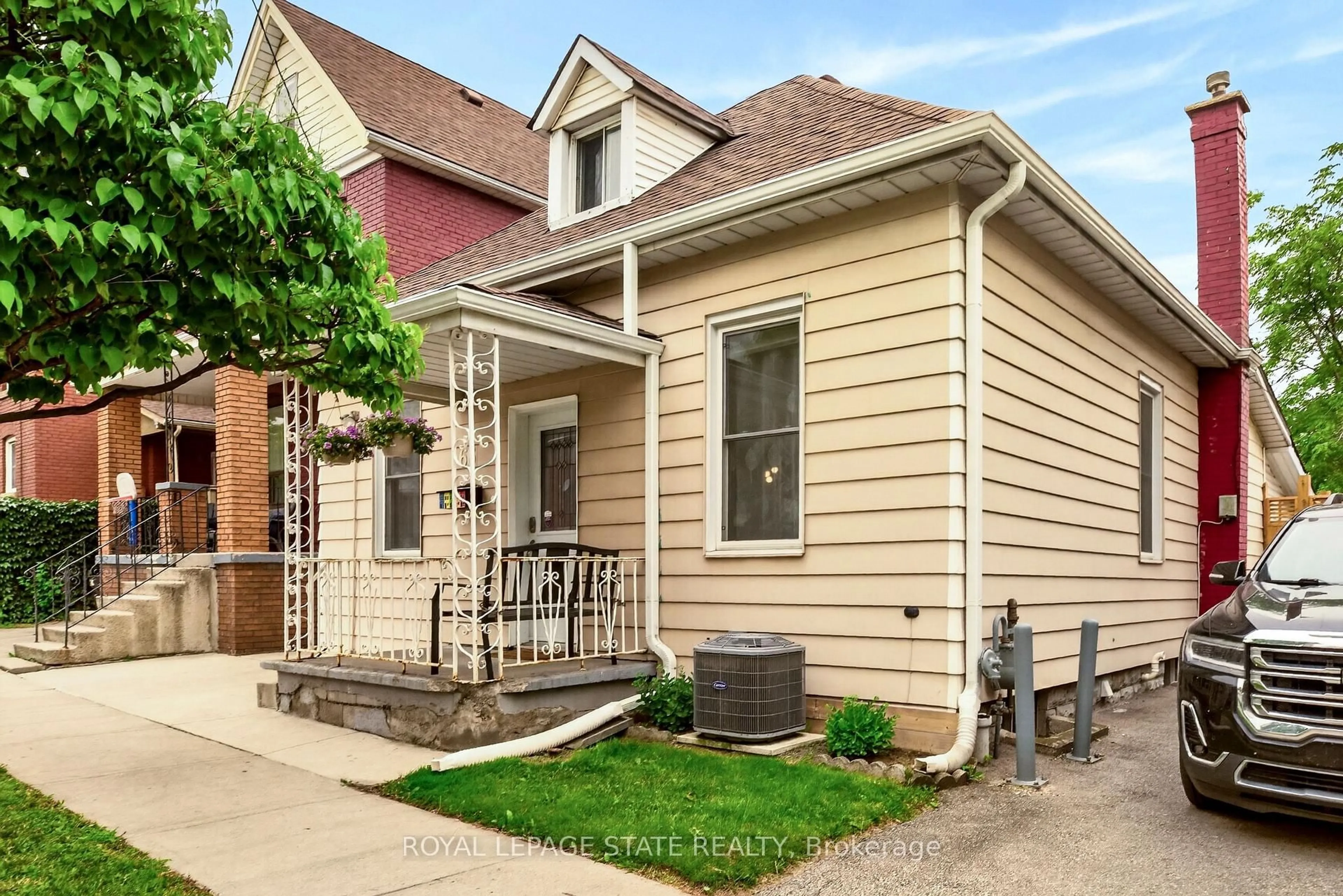 Home with brick exterior material, street for 66 Beechwood Ave, Hamilton Ontario L8L 2S4