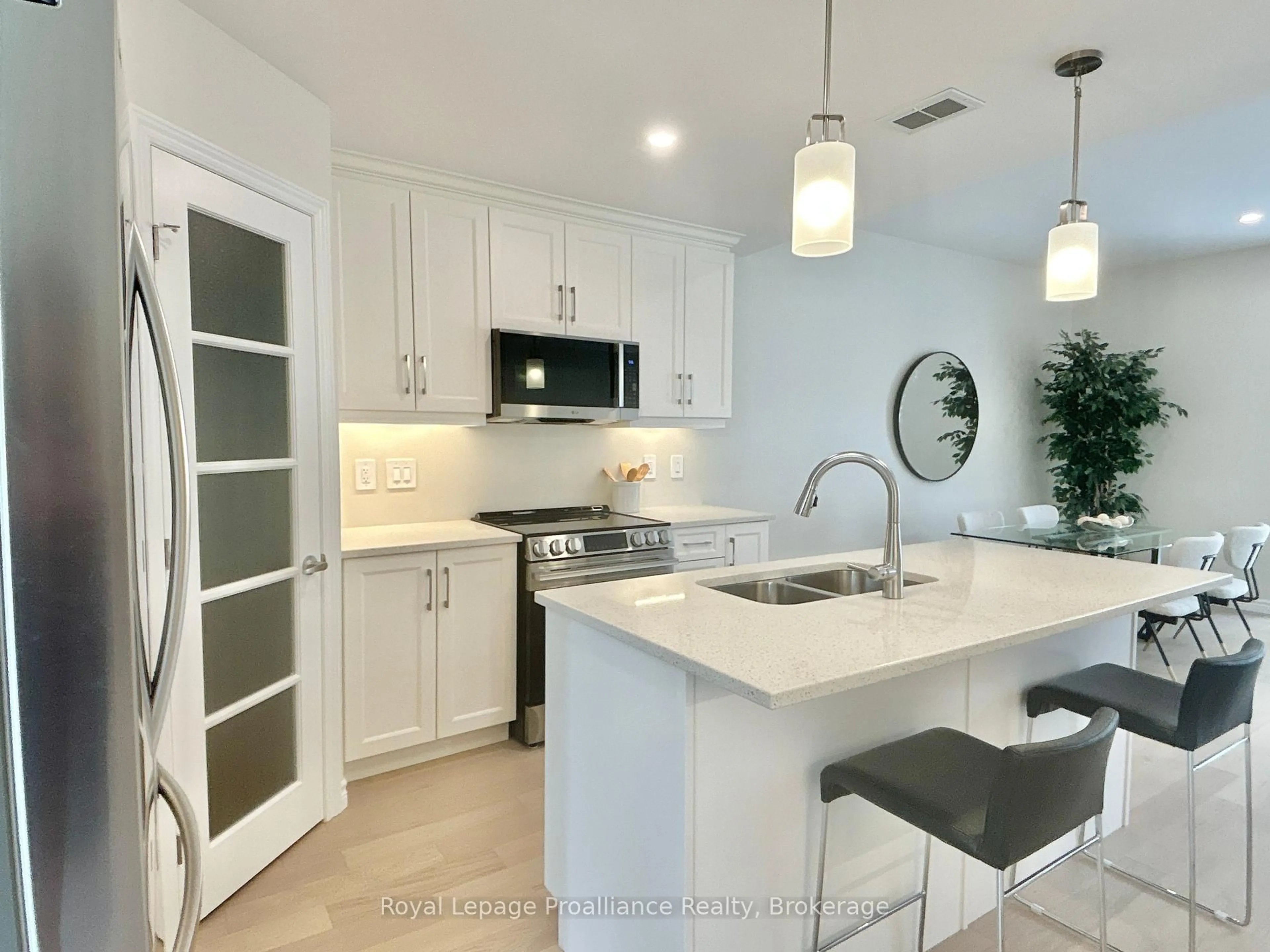 Open concept kitchen, ceramic/tile floor for 93 Athabaska Dr, Belleville Ontario K8N 0T1