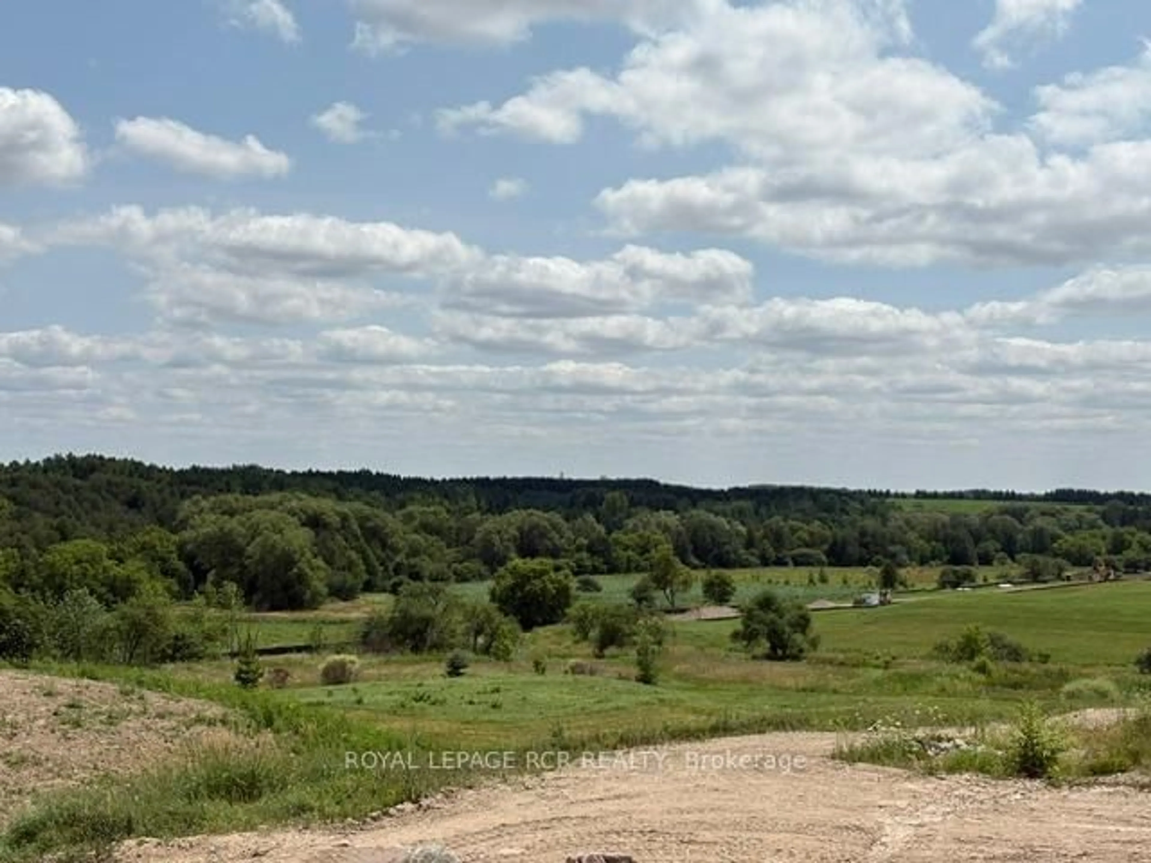 A pic from outside/outdoor area/front of a property/back of a property/a pic from drone, forest/trees view for 18 Reid Hill Dr, Mapleton Ontario N0G 1P0