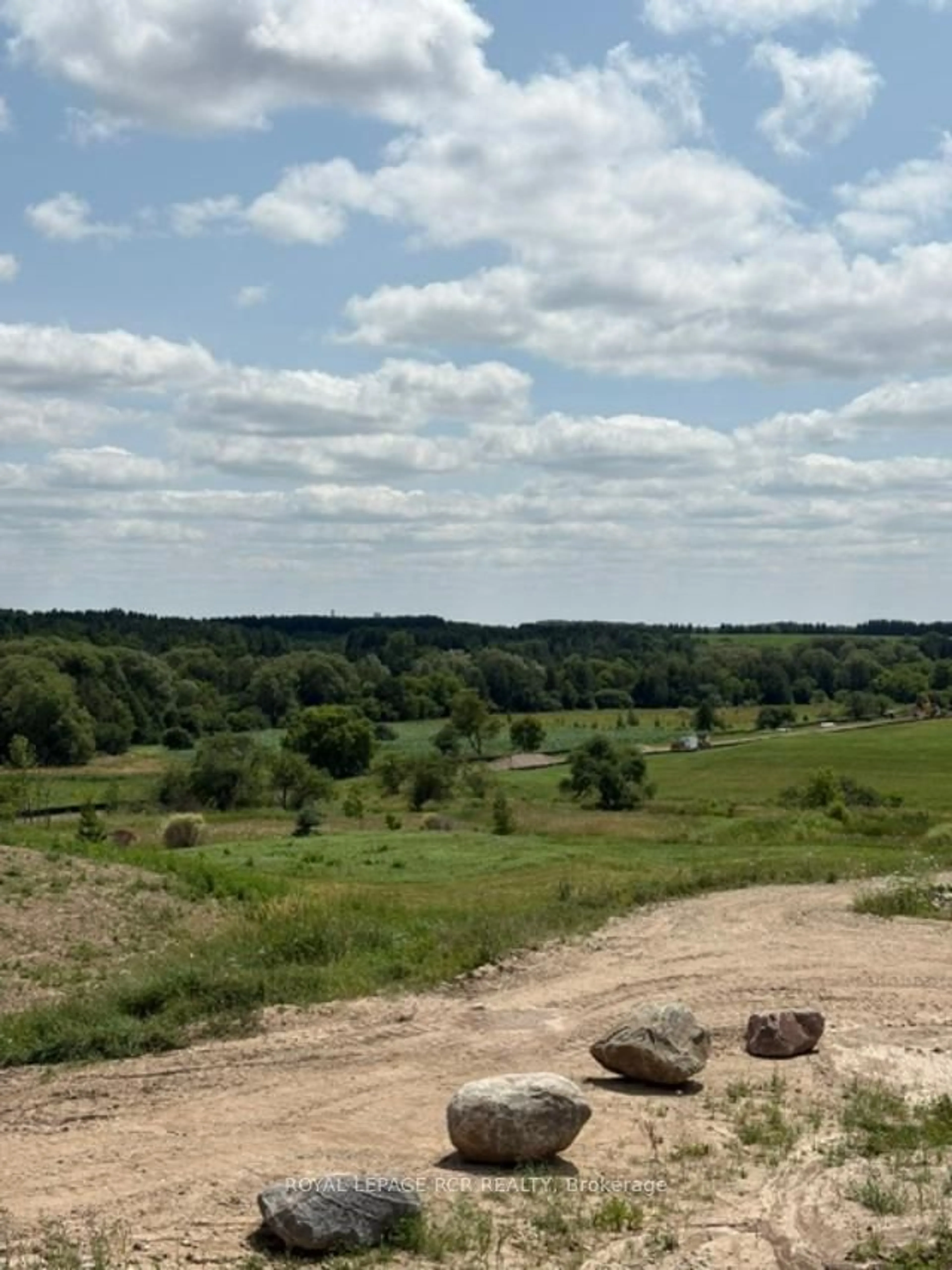 A pic from outside/outdoor area/front of a property/back of a property/a pic from drone, forest/trees view for 22 Reid Hill Dr, Mapleton Ontario N0G 1P0