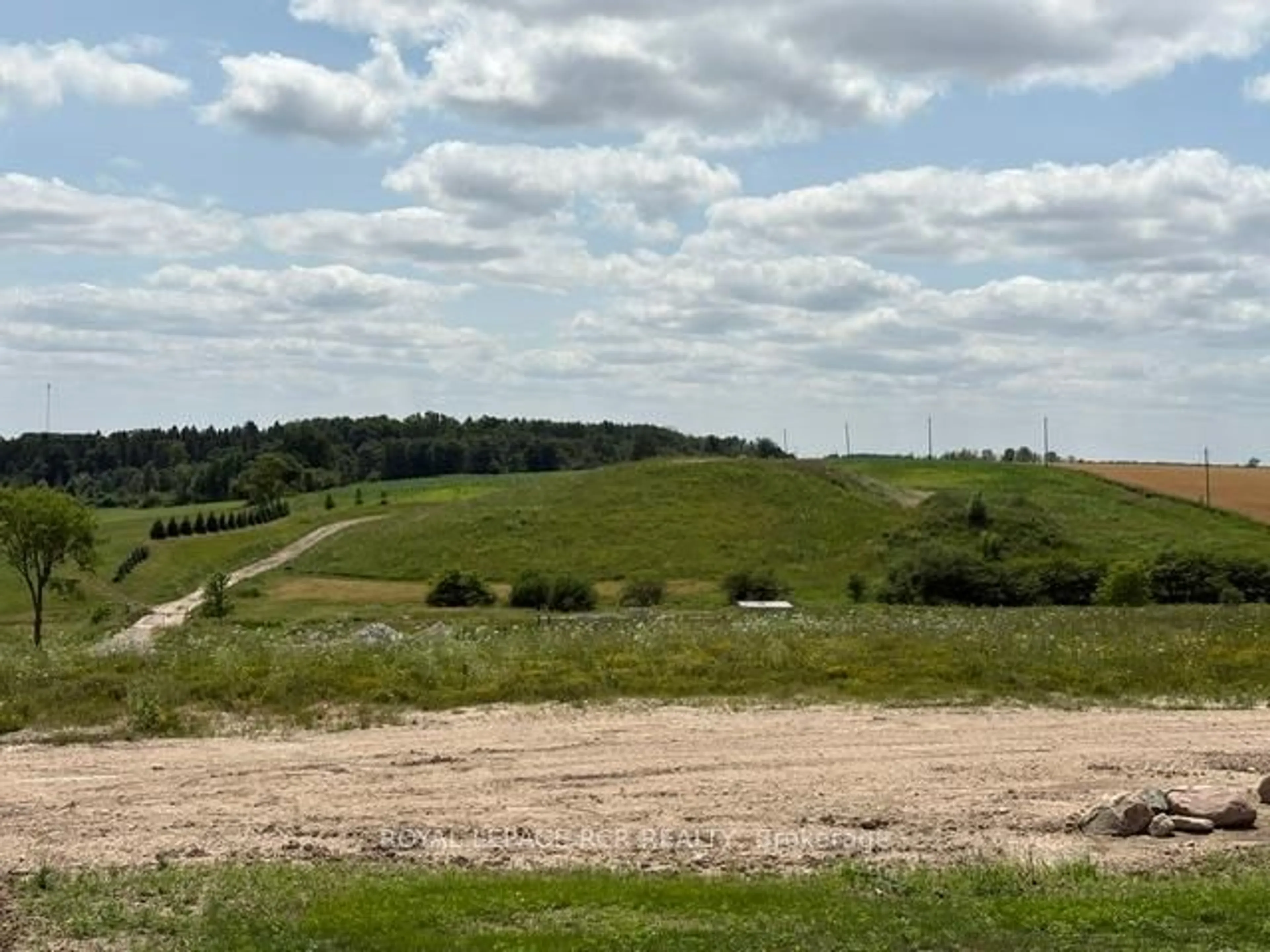 A pic from outside/outdoor area/front of a property/back of a property/a pic from drone, unknown for 22 Reid Hill Dr, Mapleton Ontario N0G 1P0