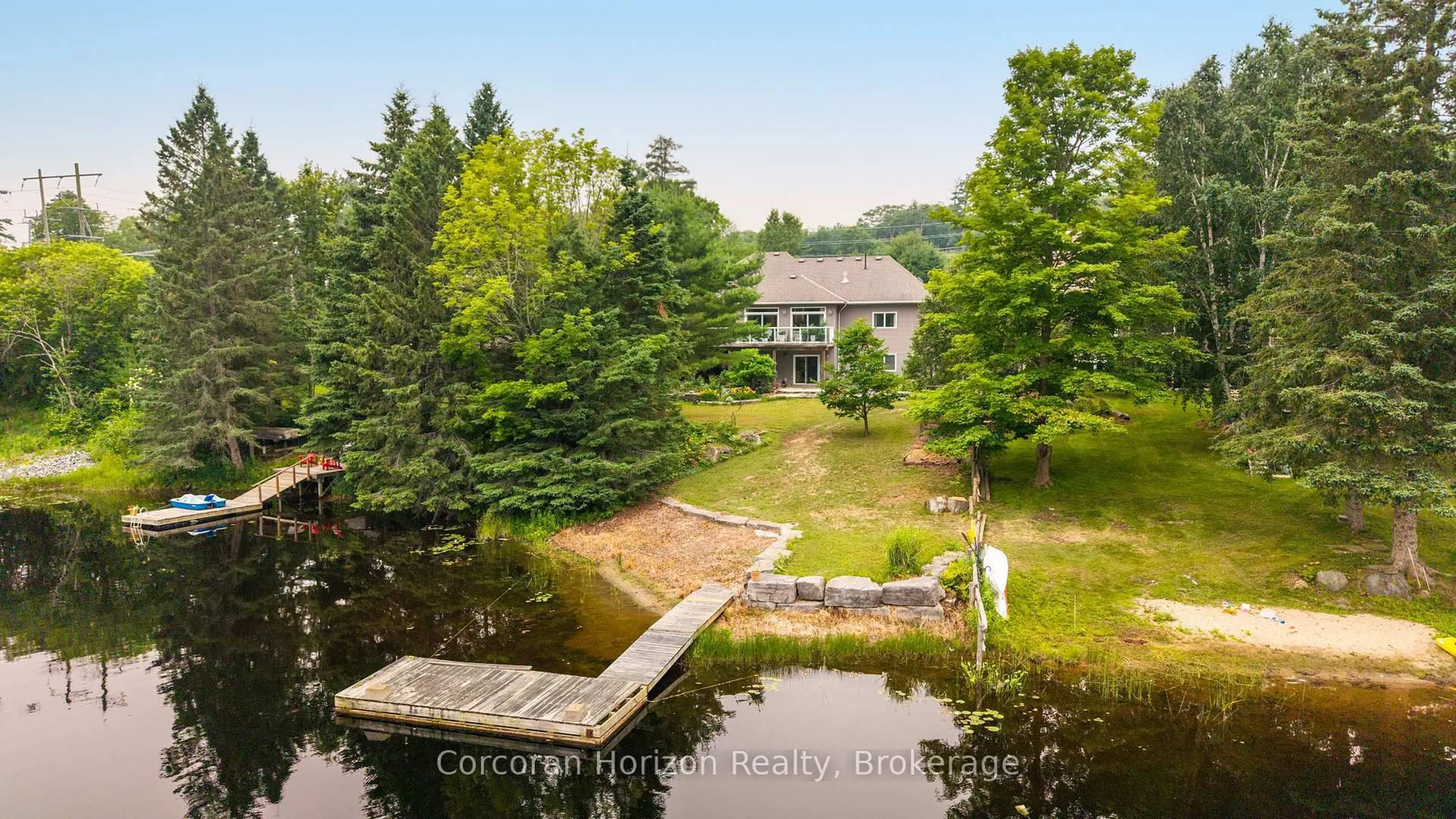 A pic from outside/outdoor area/front of a property/back of a property/a pic from drone, water/lake/river/ocean view for 131 William St, Parry Sound Ontario P2A 1V9