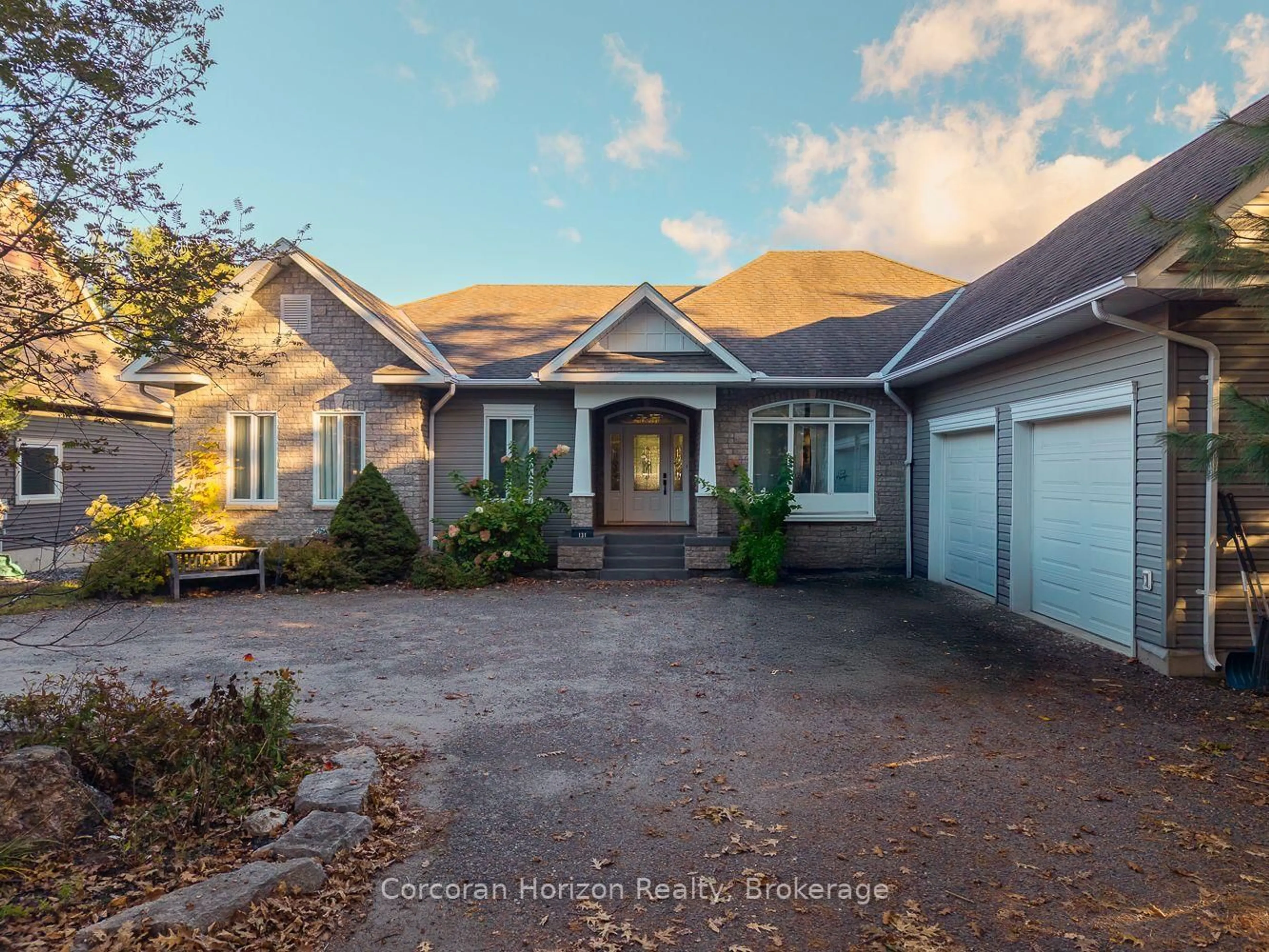 A pic from outside/outdoor area/front of a property/back of a property/a pic from drone, unknown for 131 William St, Parry Sound Ontario P2A 1V9