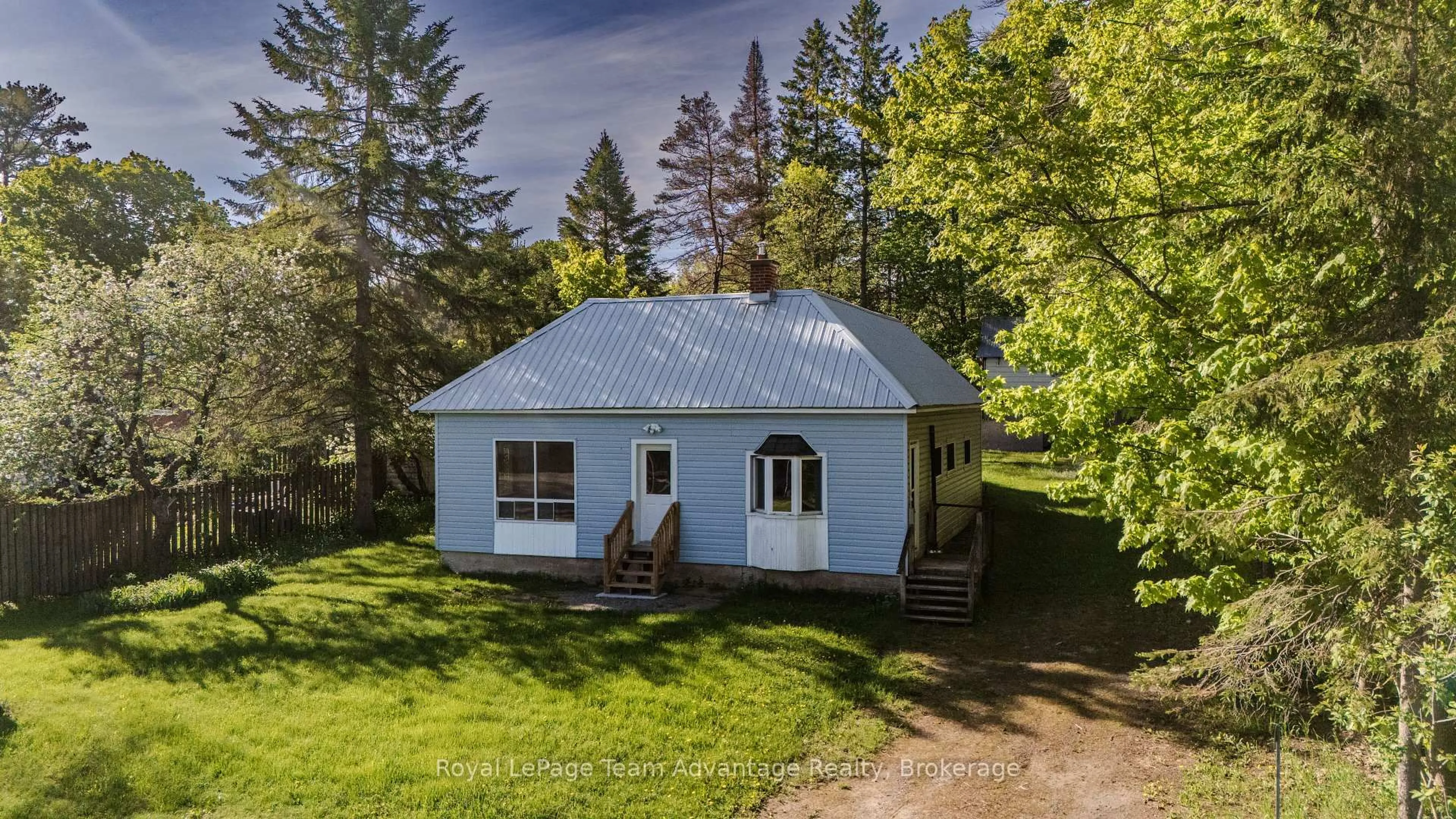 A pic from outside/outdoor area/front of a property/back of a property/a pic from drone, unknown for 9 632 Highway, Seguin Ontario P0C 1J0