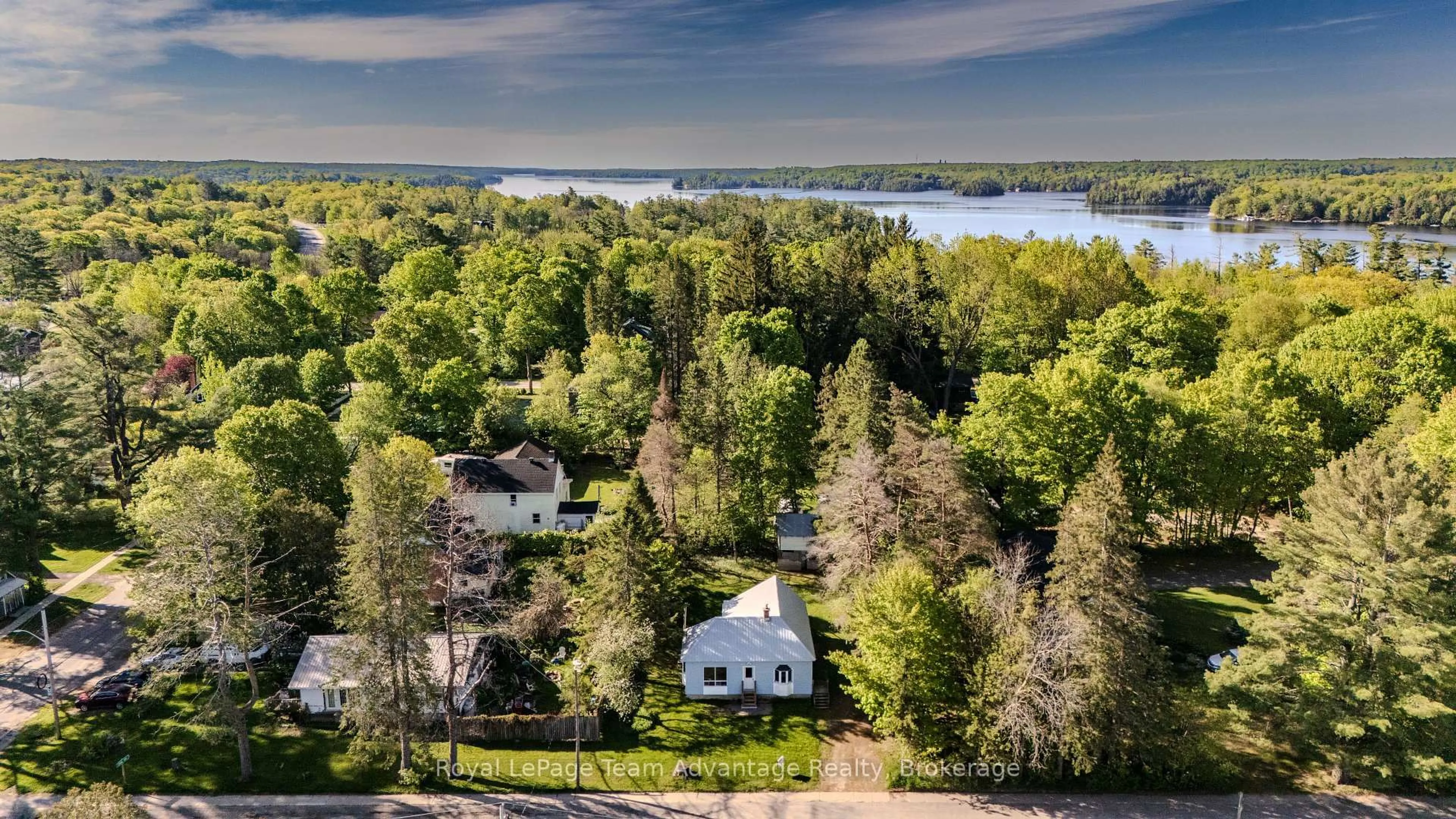 A pic from outside/outdoor area/front of a property/back of a property/a pic from drone, water/lake/river/ocean view for 9 632 Highway, Seguin Ontario P0C 1J0