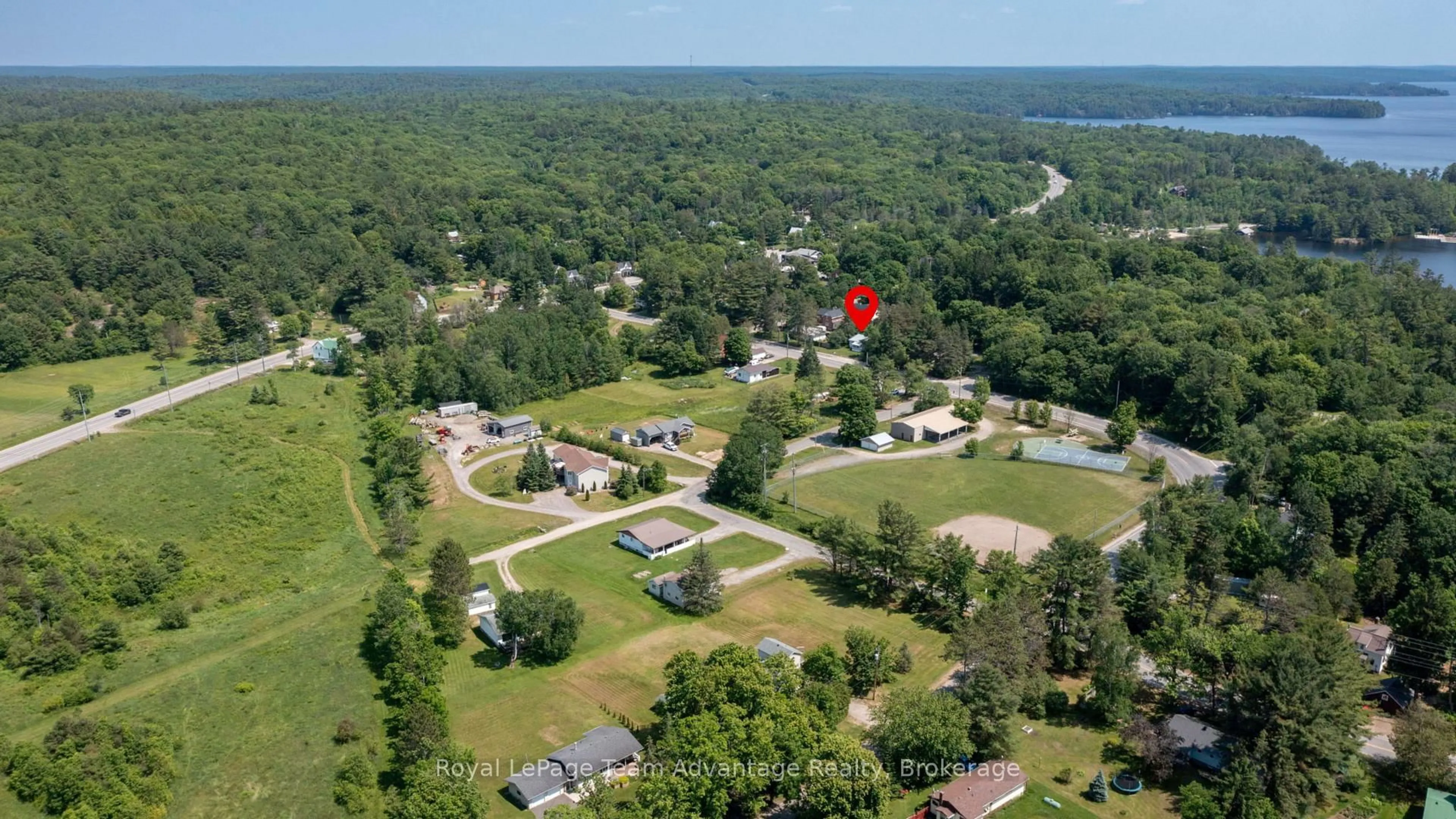 A pic from outside/outdoor area/front of a property/back of a property/a pic from drone, water/lake/river/ocean view for 9 632 Highway, Seguin Ontario P0C 1J0