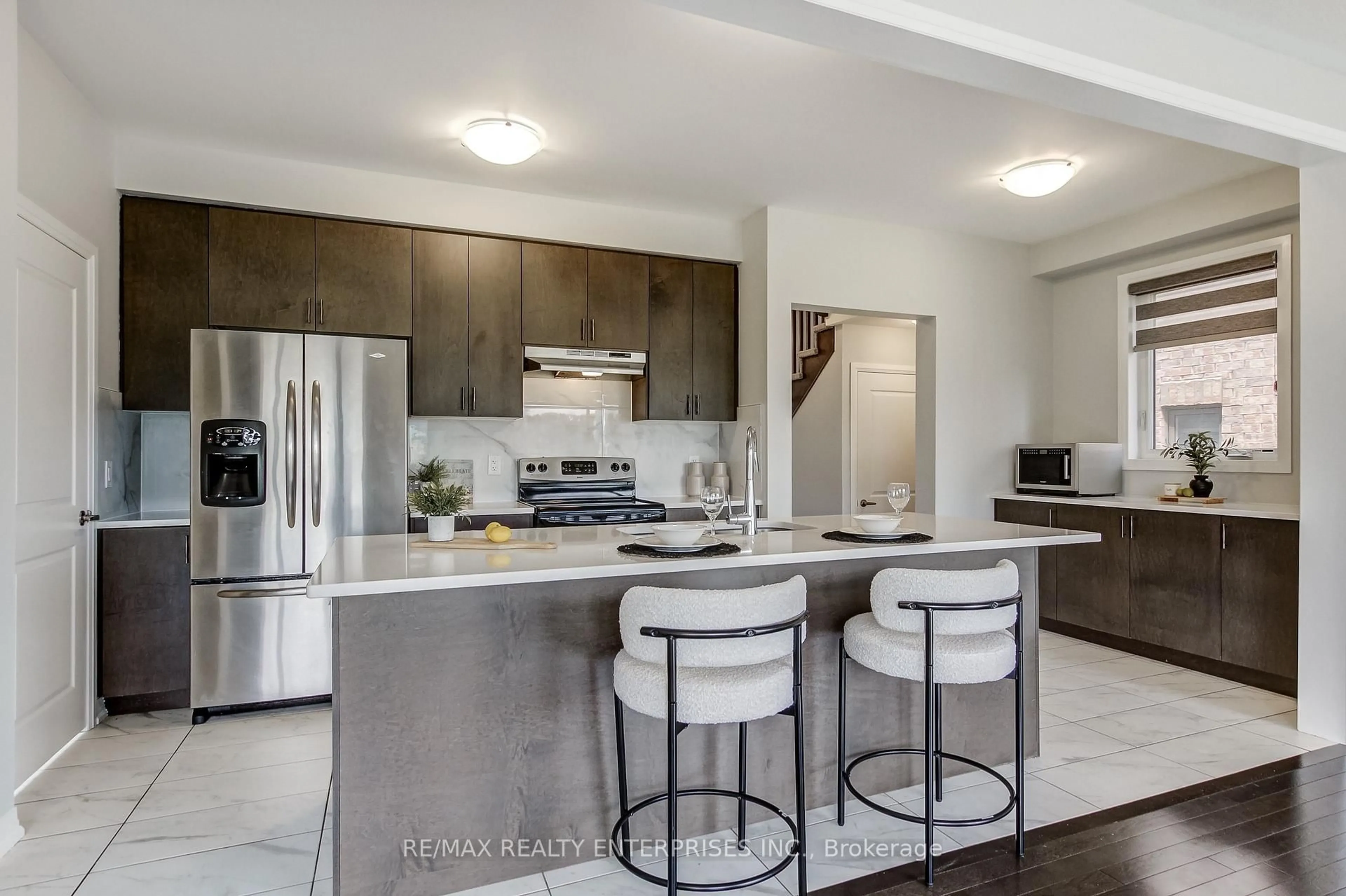 Open concept kitchen, ceramic/tile floor for 113 Leslie Davis St, North Dumfries Ontario N0B 1E0